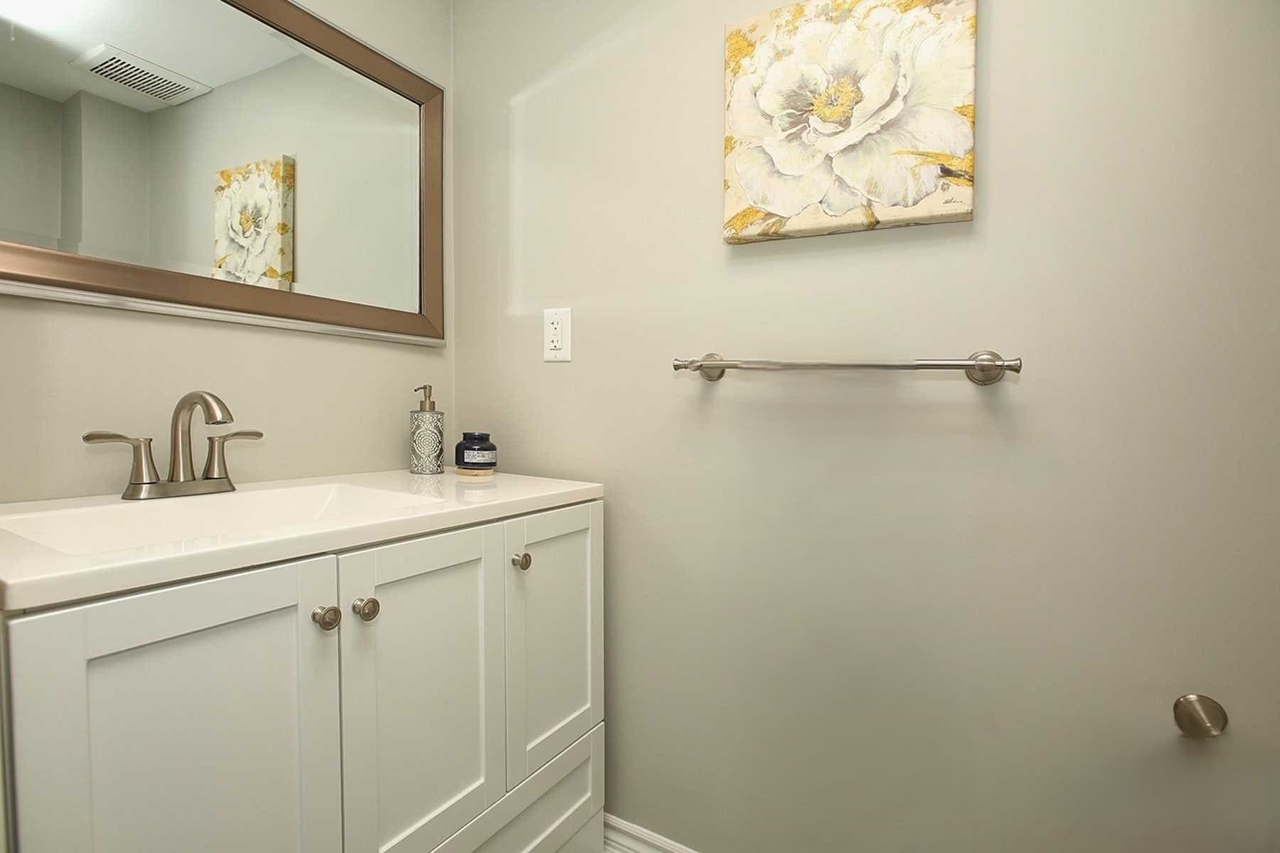 Modern Bathroom with Vanity and Mirror at 4 Edison Way, Whitby, ON – 2 Bedroom Basement Apartment, a 2 bedroom rental in 4 Edison Way, Whitby, ON, listed for $1,600 per month