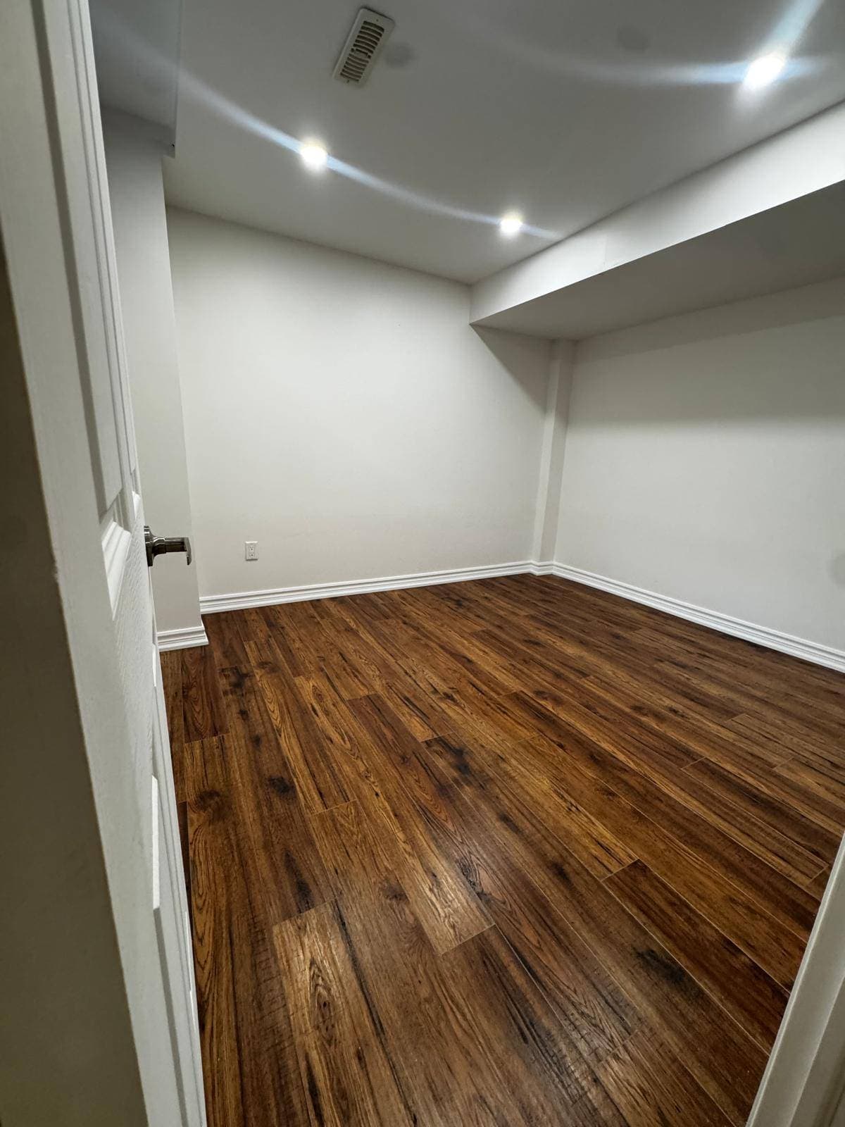 Cozy Primary Bedroom with Wood Flooring at 4 Edison Way, Whitby, ON – 2 Bedroom Basement Apartment, a 2 bedroom rental in 4 Edison Way, Whitby, ON, listed for $1,600 per month