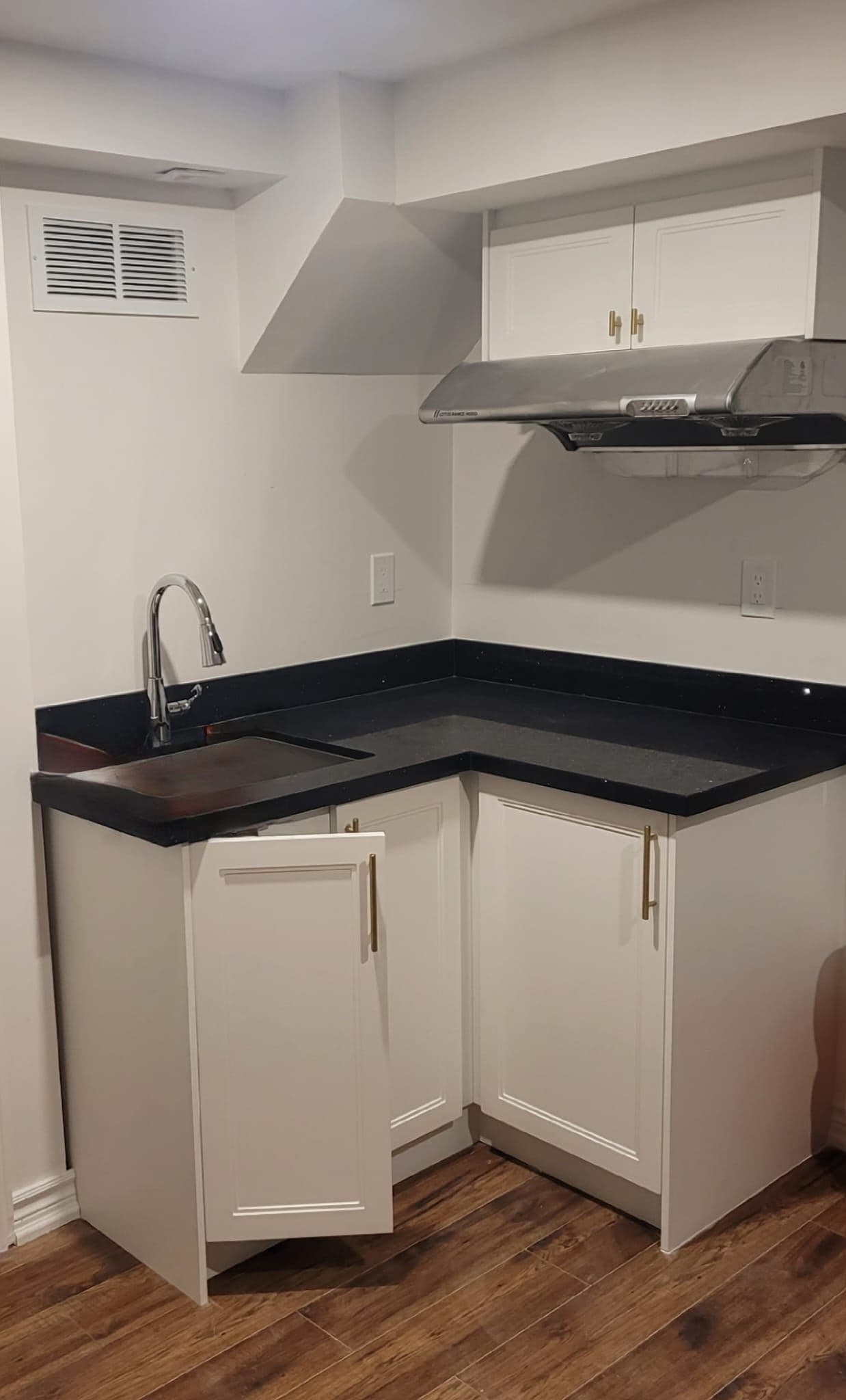 Compact Kitchen with Dark Countertop at 4 Edison Way, Whitby, ON – 2 Bedroom Basement Apartment, a 2 bedroom rental in 4 Edison Way, Whitby, ON, listed for $1,600 per month
