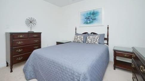 Cozy Primary Bedroom with Blue Accents at 4 Edison Way, Whitby, ON – 2 Bedroom Basement Apartment, a 2 bedroom rental in 4 Edison Way, Whitby, ON, listed for $1,600 per month