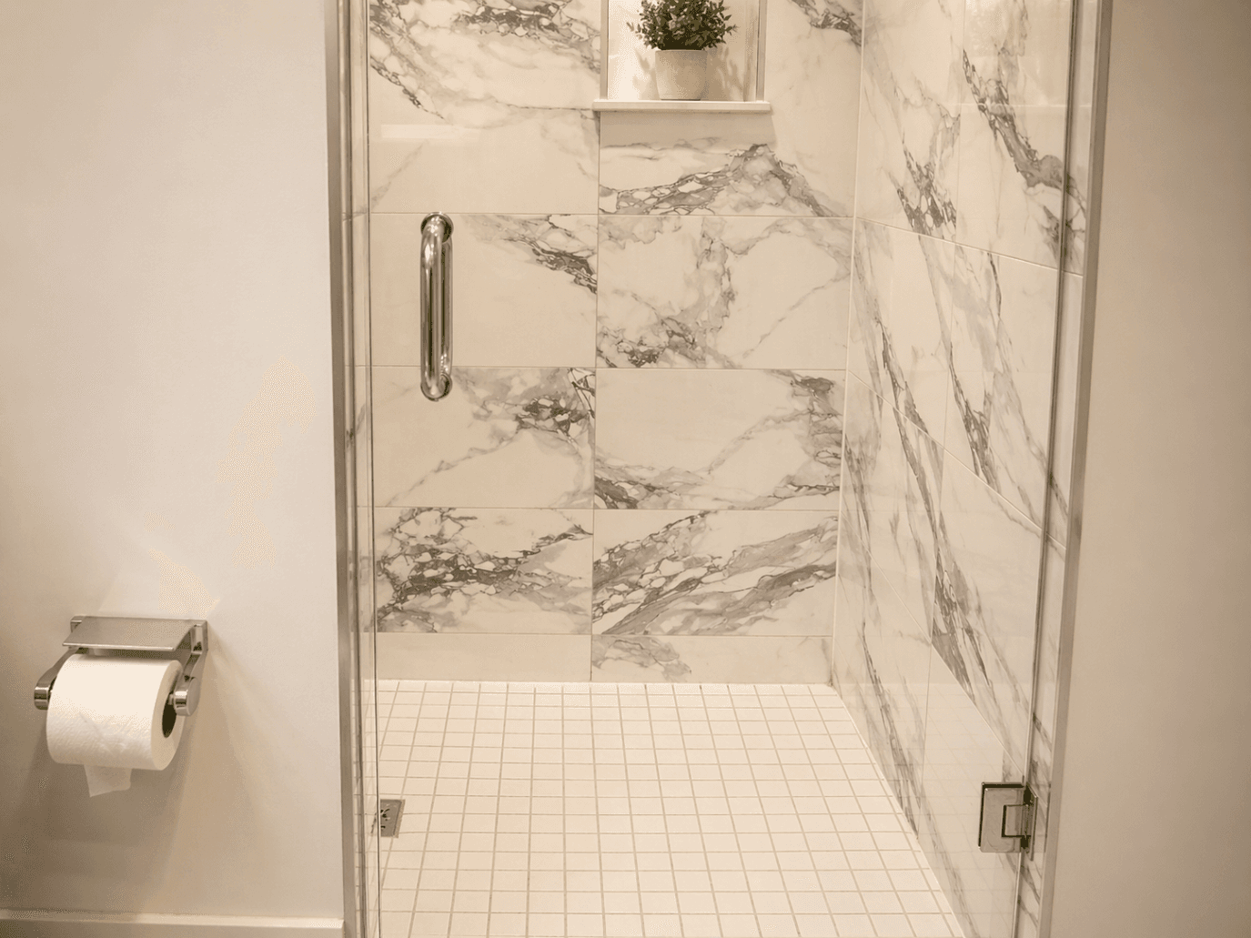 Stylish Shower with Marble Tiles at Modern Studio Apartment in Ancaster – 424 Springbrook Avenue, a 1 bedroom rental in 424 Springbrook Avenue, Hamilton, ON, listed for $1,200 per month