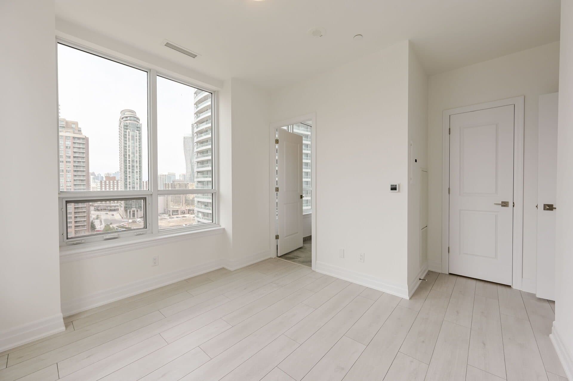 Bright Modern Bedroom with City Views at Rental Listing in Mississauga, a 2 bedroom rental in 30 Elm Drive West, Mississauga, ON, listed for $2,500 per month