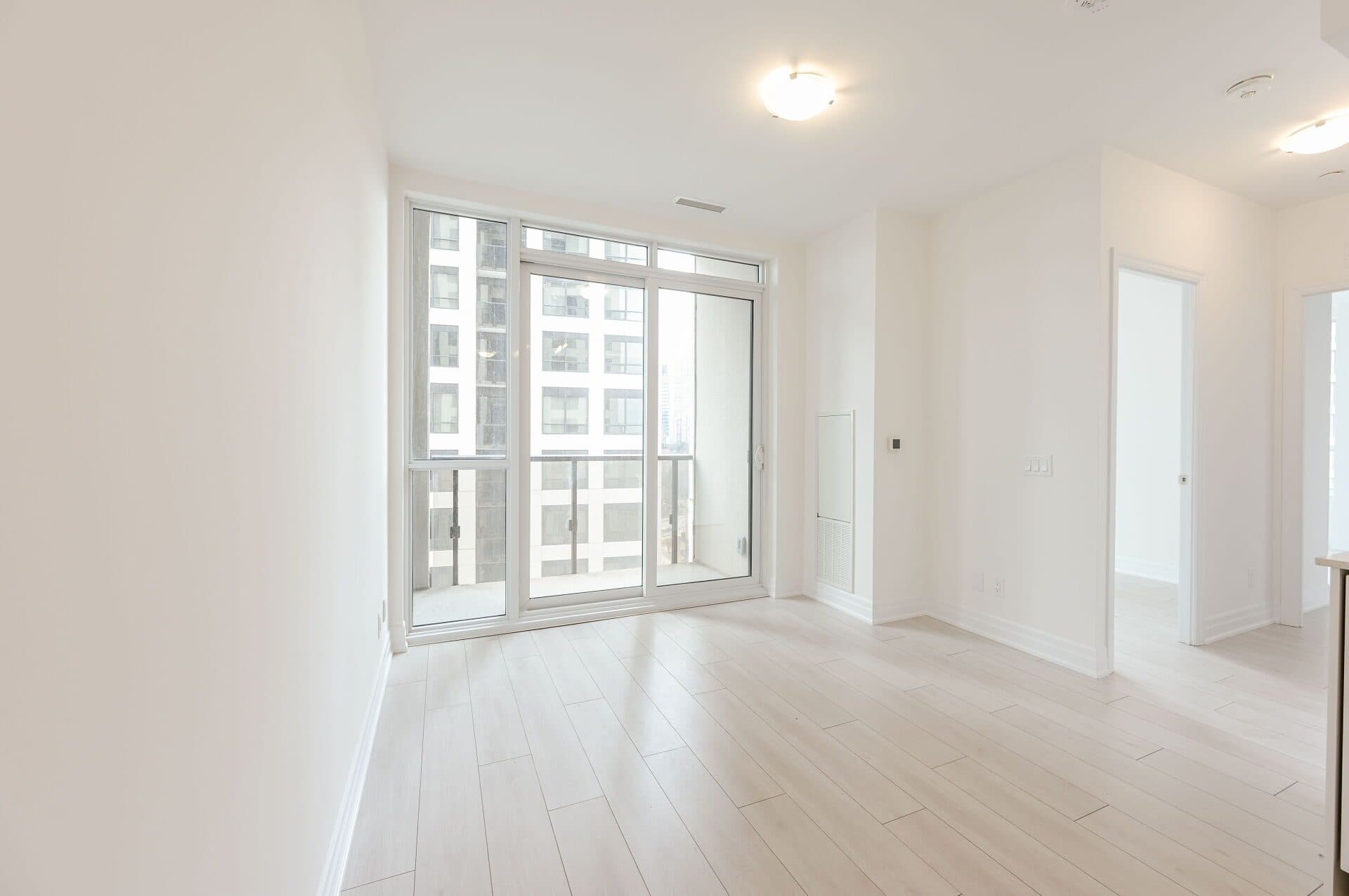 Spacious Living Room with Large Windows at Rental Listing in Mississauga, a 2 bedroom rental in 30 Elm Drive West, Mississauga, ON, listed for $2,500 per month