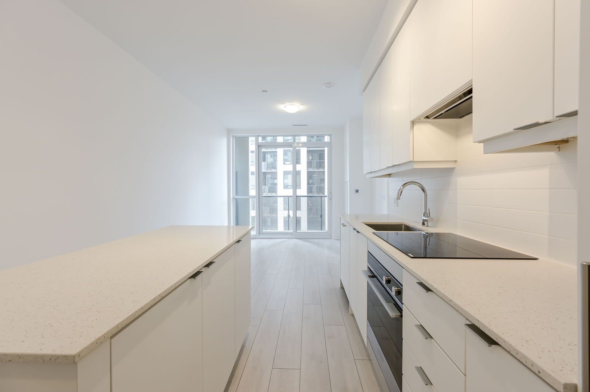 Modern Kitchen with Sleek Design at Rental Listing in Mississauga, a 2 bedroom rental in 30 Elm Drive West, Mississauga, ON, listed for $2,500 per month
