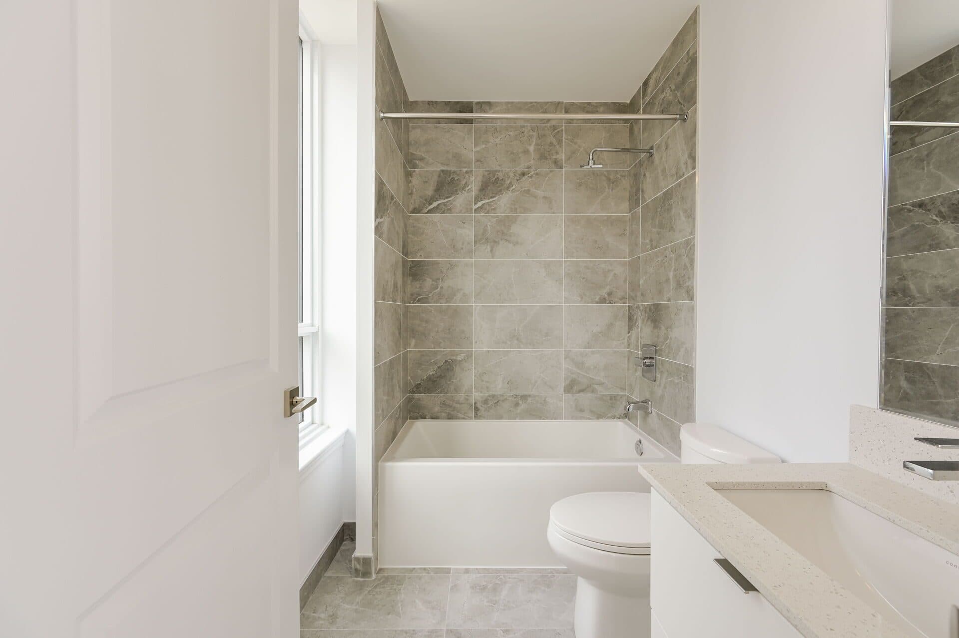 Modern Bathroom with Standalone Tub at Rental Listing in Mississauga, a 2 bedroom rental in 30 Elm Drive West, Mississauga, ON, listed for $2,500 per month