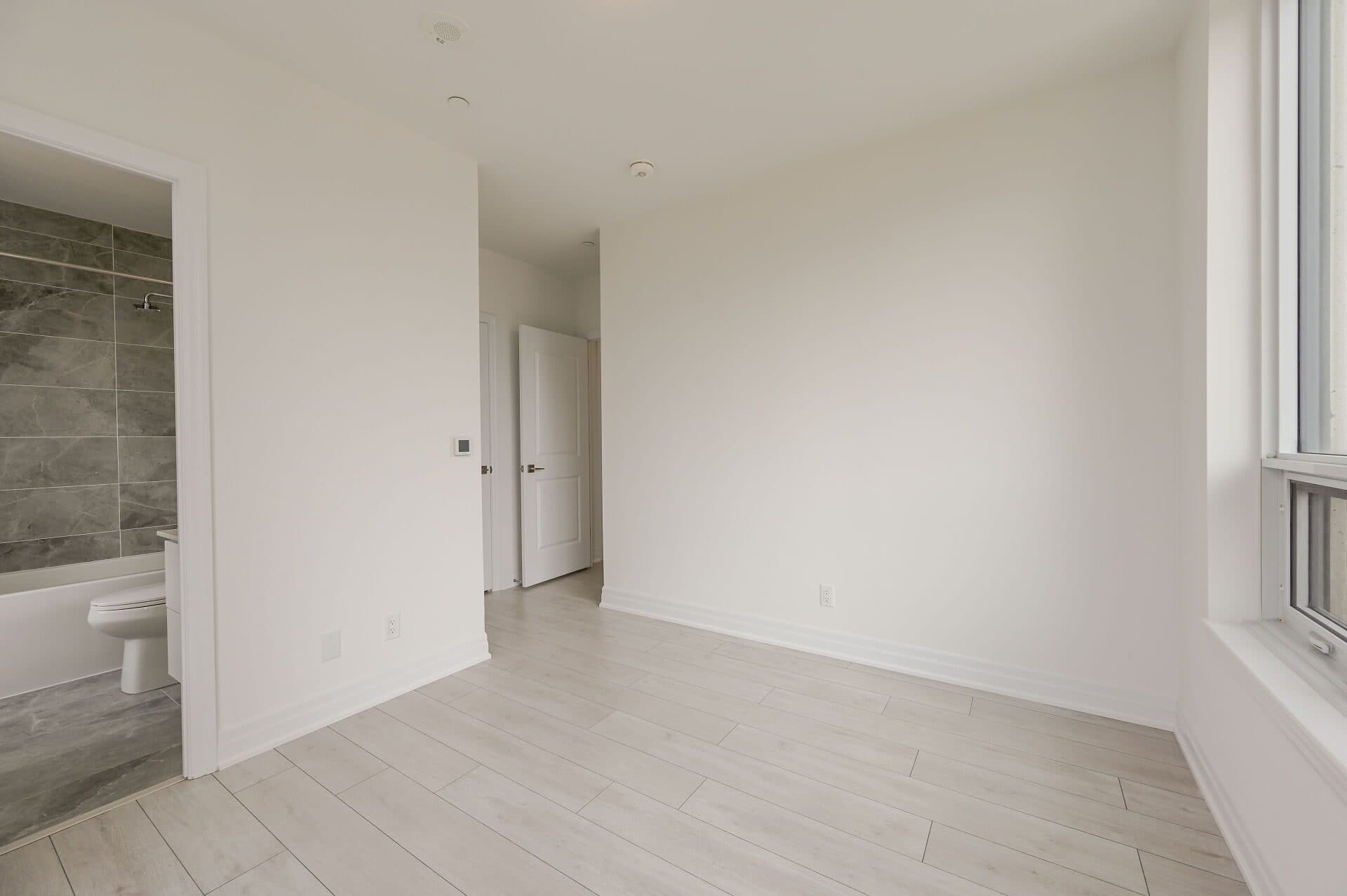 Spacious Guest Bedroom with Modern Finishes at Rental Listing in Mississauga, a 2 bedroom rental in 30 Elm Drive West, Mississauga, ON, listed for $2,500 per month