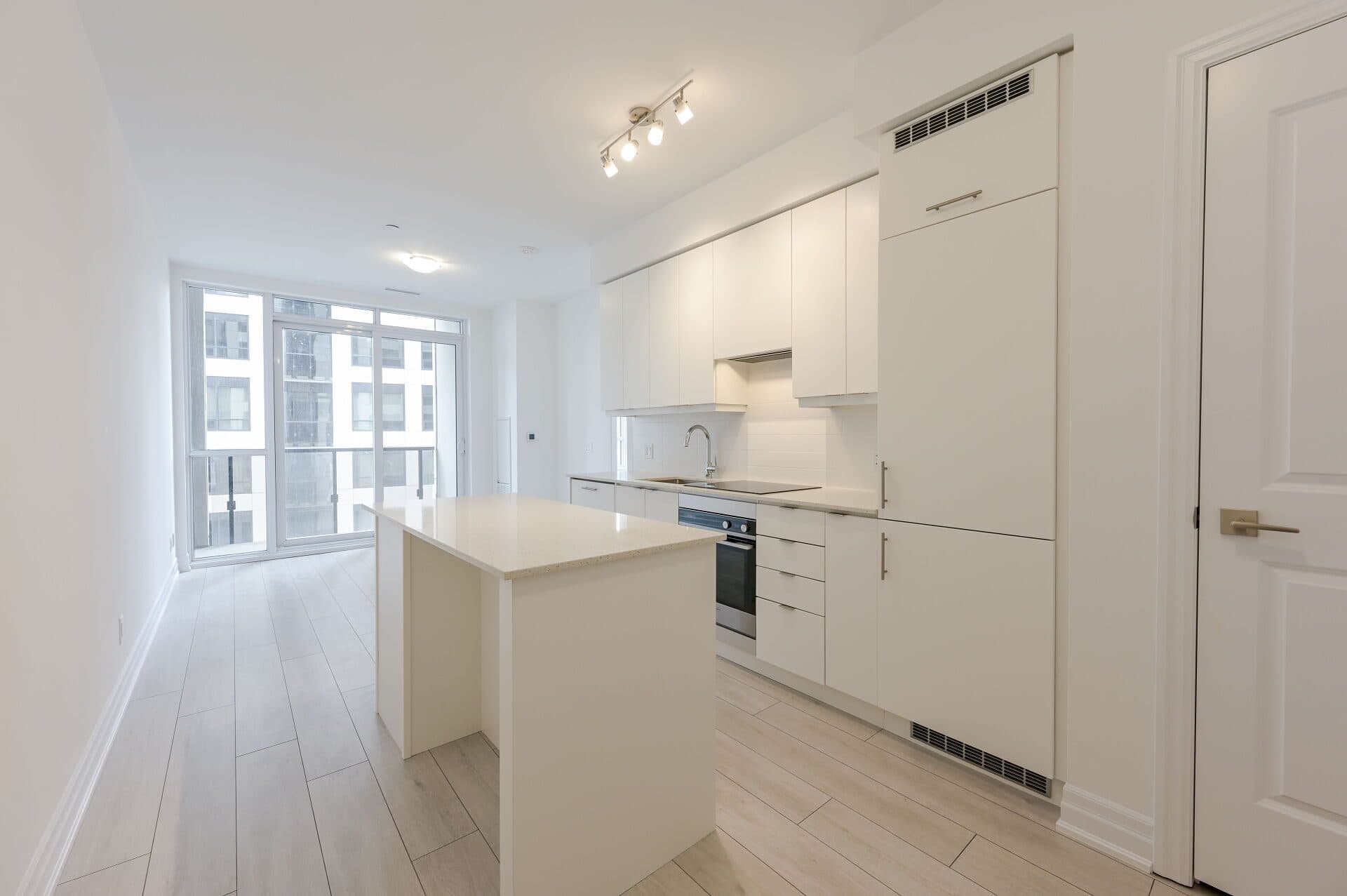 Modern Kitchen with Island at Rental Listing in Mississauga, a 2 bedroom rental in 30 Elm Drive West, Mississauga, ON, listed for $2,500 per month