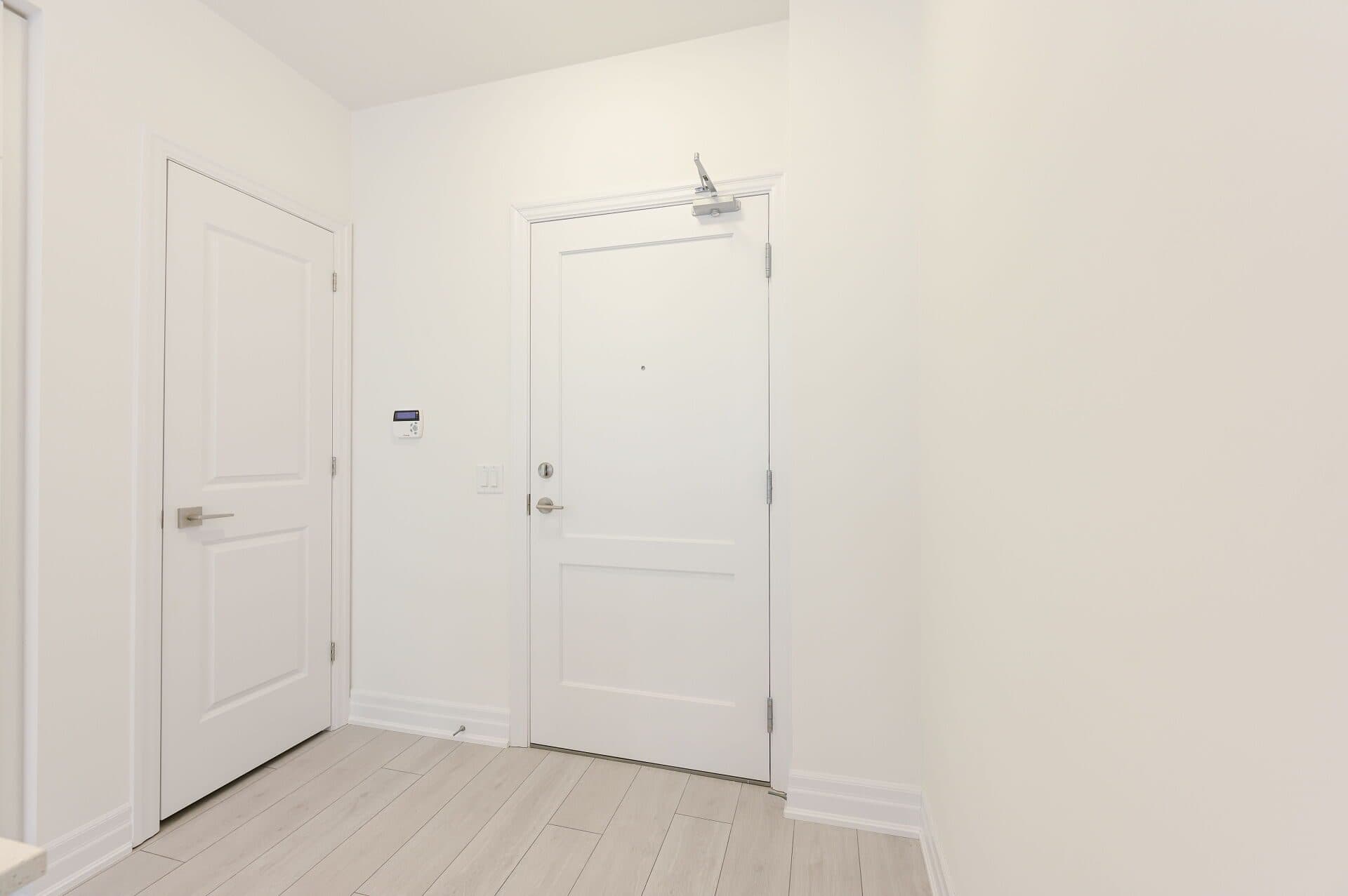 Bright and Minimalist Entryway at Rental Listing in Mississauga, a 2 bedroom rental in 30 Elm Drive West, Mississauga, ON, listed for $2,500 per month