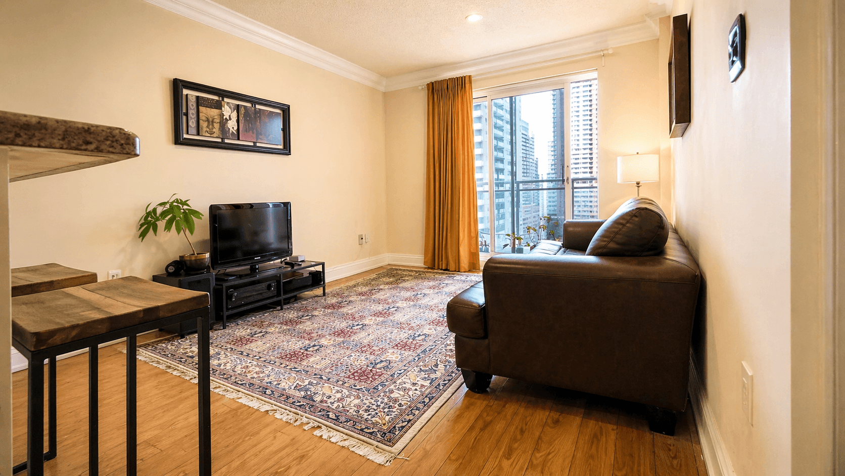 Cozy Living Room with City View at 1-Bedroom Condo in Prime Richmond Hill Location, a 1 bedroom rental in 39 Oneida Crescent, Richmond Hill, ON, listed for $2,075 per month