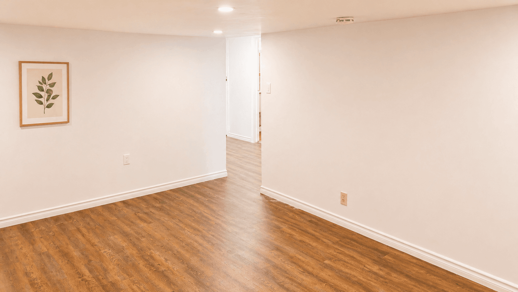 Interior Space with Wood Flooring at Modern 2-Bedroom Condo (Lower Level) in Hintonburg – Parking Included, a 2 bedroom rental in 210 Armstrong Street, Ottawa, ON, listed for $1,850 per month