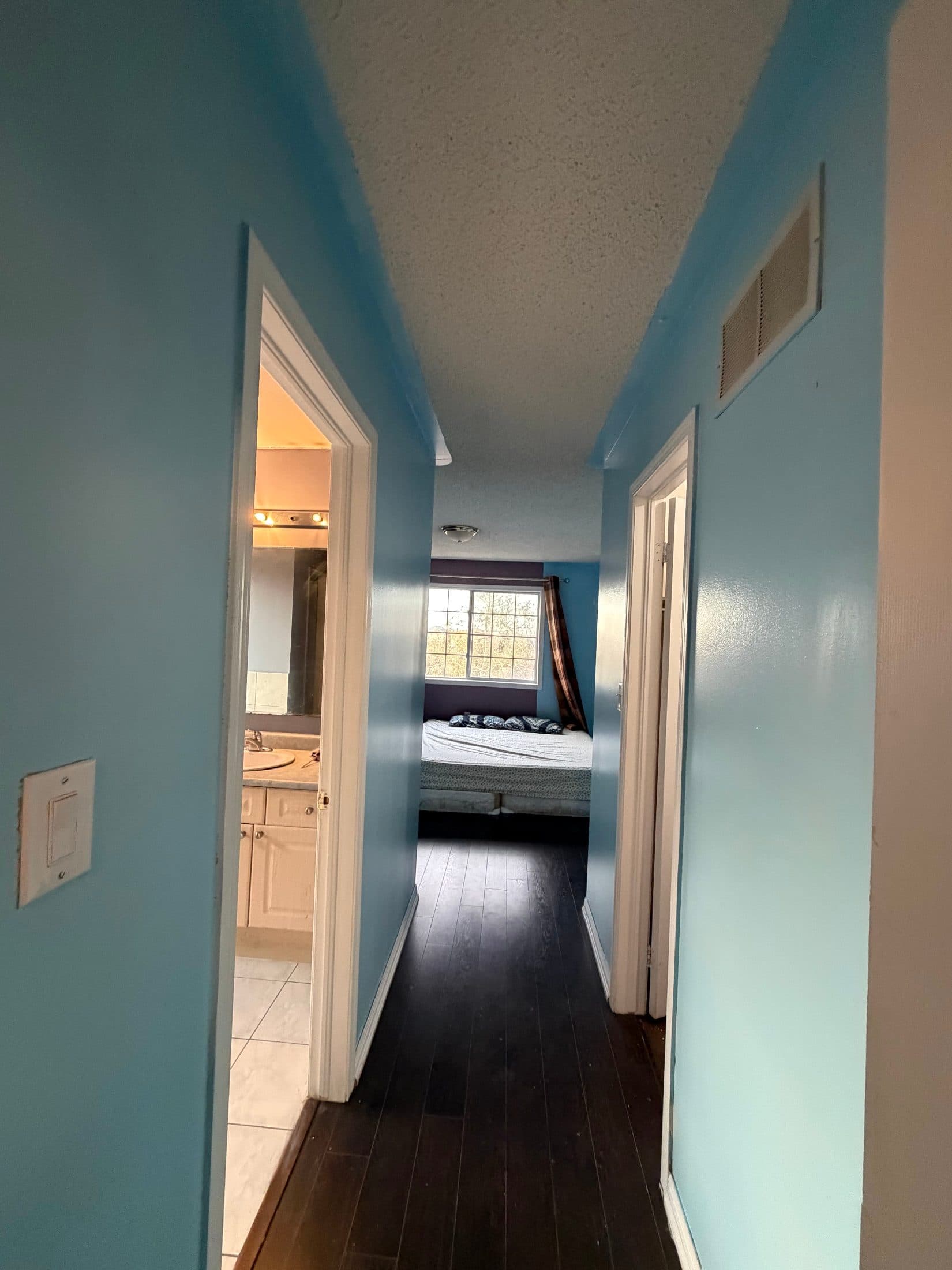 Hallway with Bedrooms and Bathroom View at Spacious 4 Bedroom Detached Home for Rent in Brampton – 85 Herdwick Street, a 4 bedroom rental in 85 Herdwick Street, Brampton, ON, listed for $3,250 per month