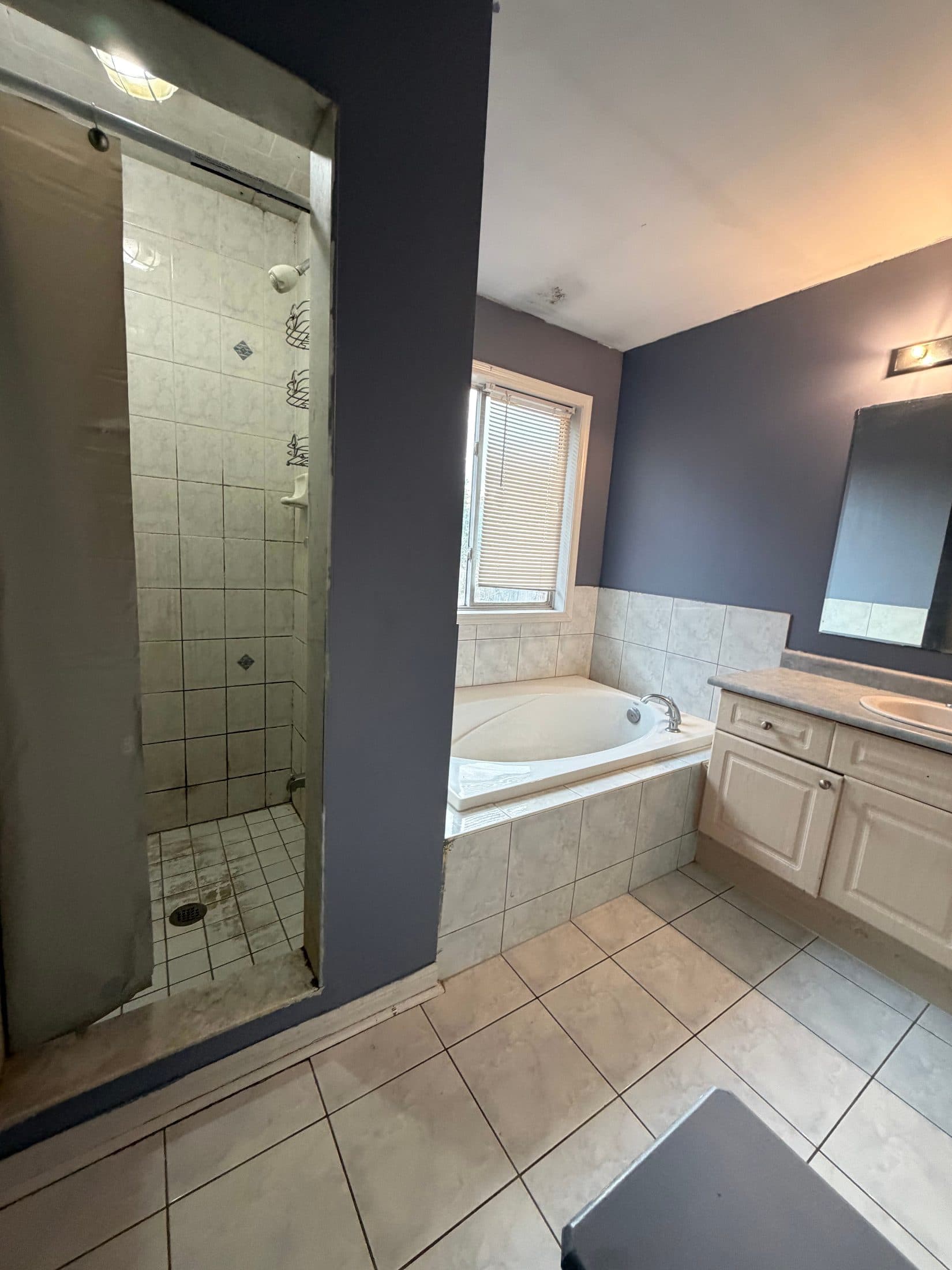 Bathroom with Shower and Bathtub at Spacious 4 Bedroom Detached Home for Rent in Brampton – 85 Herdwick Street, a 4 bedroom rental in 85 Herdwick Street, Brampton, ON, listed for $3,250 per month