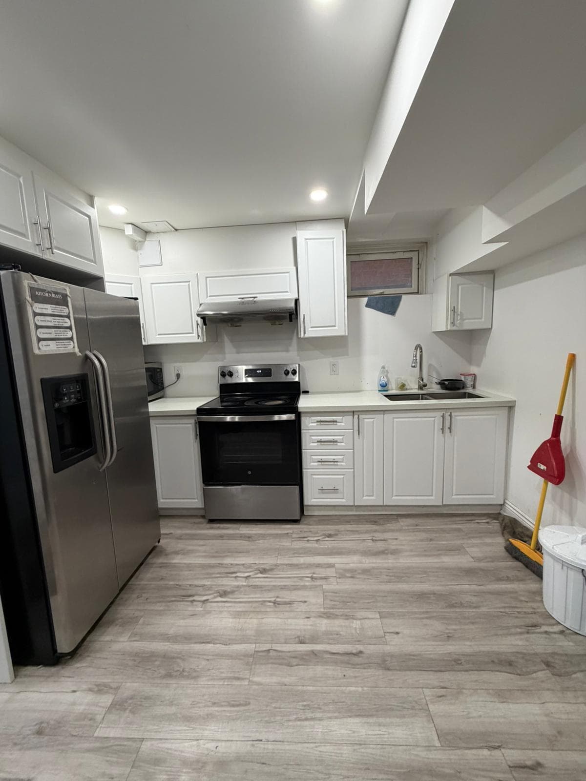 Modern Kitchen with Stainless Steel Appliances at Spacious Private Room in 4 Bed Basement., a 1 bedroom rental in 48 Maddybeth Crescent, Brampton, ON, listed for $850 per month