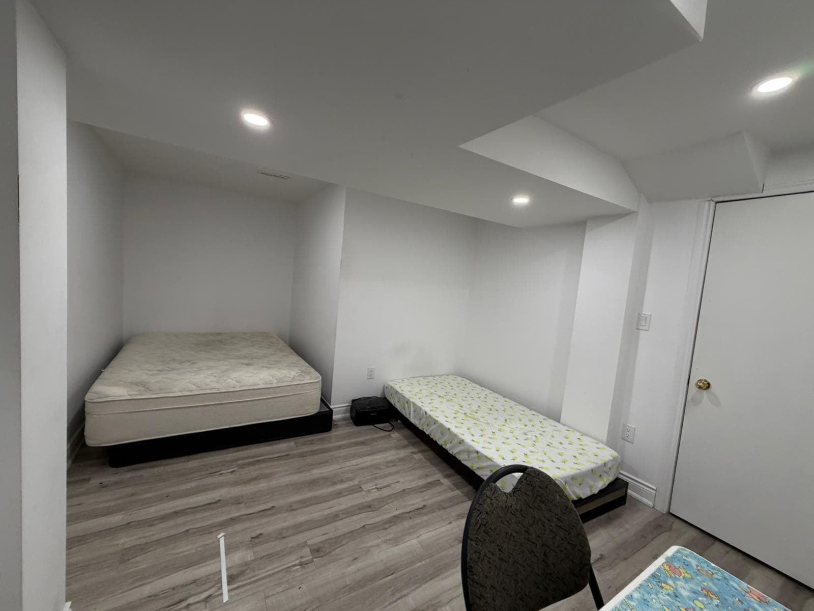 Guest Bedroom with Two Beds at Spacious Private Room in 4 Bed Basement., a 1 bedroom rental in 48 Maddybeth Crescent, Brampton, ON, listed for $850 per month