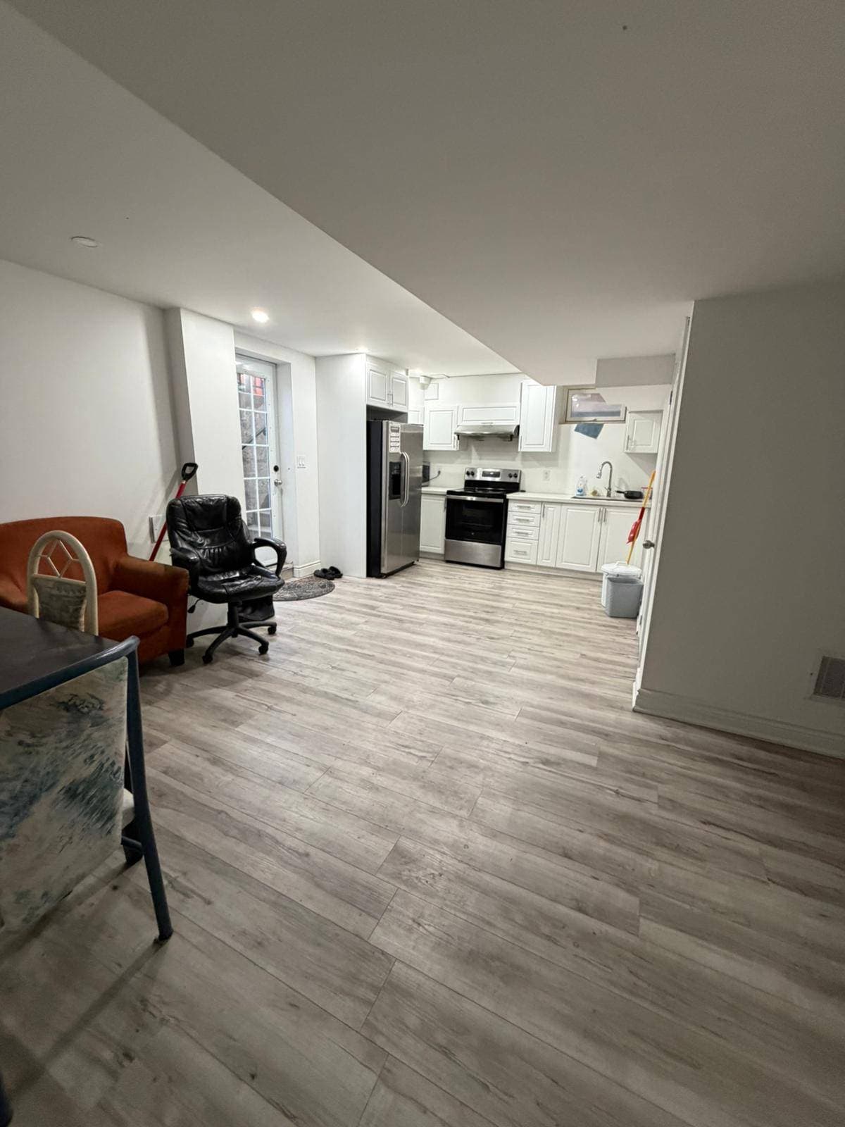 Modern Kitchen and Living Area at Spacious Private Room in 4 Bed Basement., a 1 bedroom rental in 48 Maddybeth Crescent, Brampton, ON, listed for $850 per month