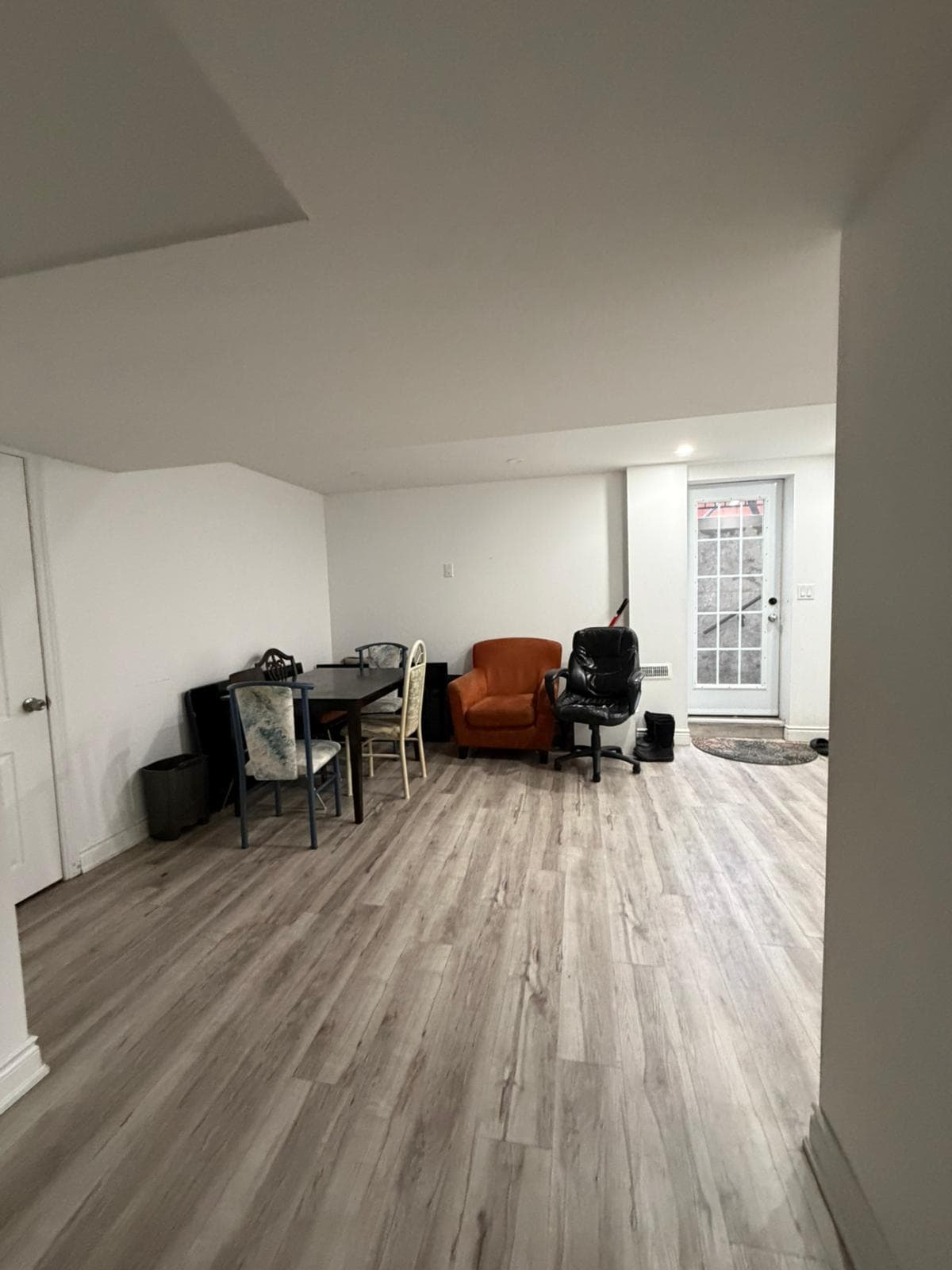 Open Living Area with Dining Table and Chairs at Spacious Private Room in 4 Bed Basement., a 1 bedroom rental in 48 Maddybeth Crescent, Brampton, ON, listed for $850 per month