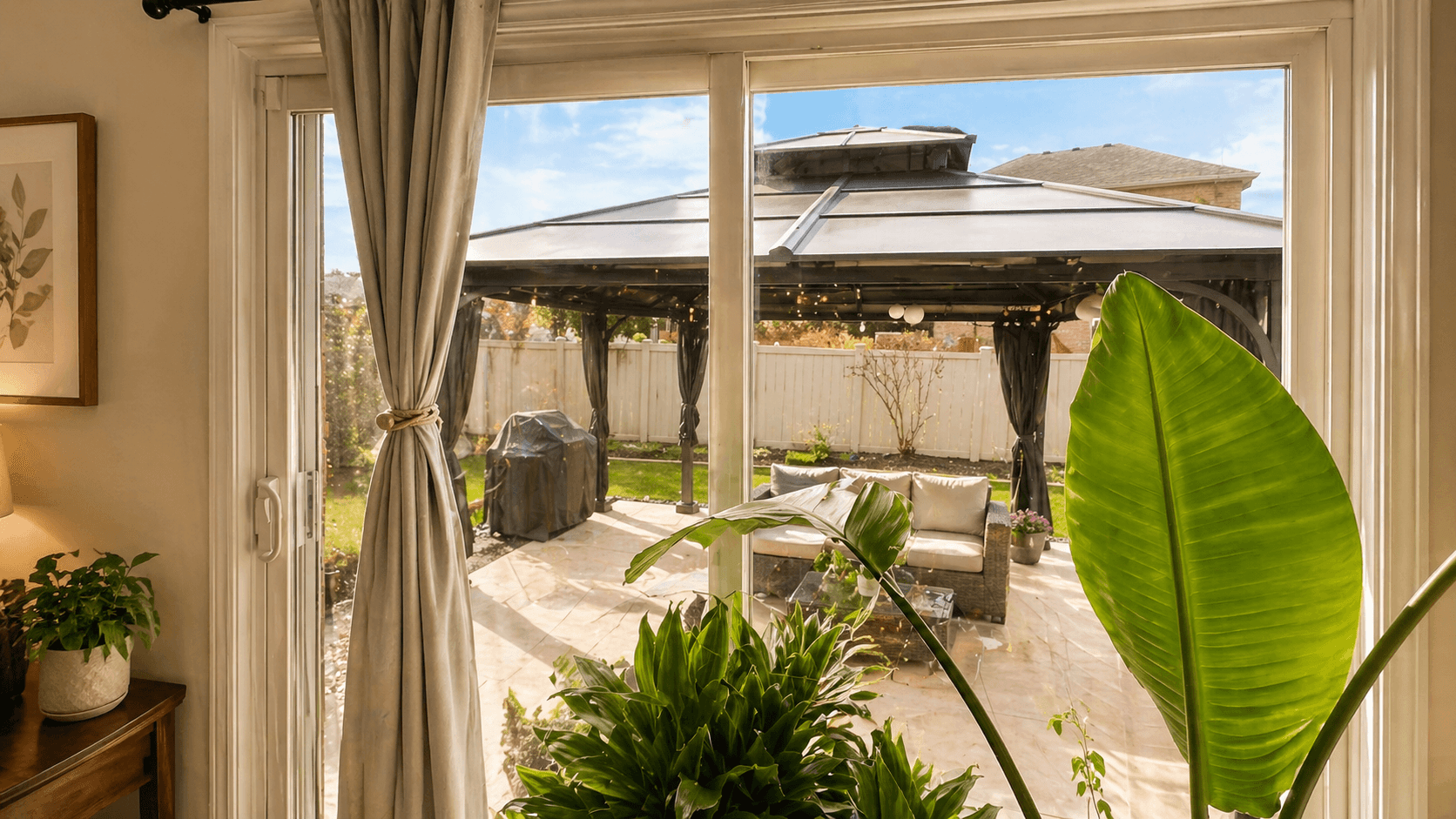 Backyard Patio with Seating Area at 2 Bedroom Main Floor Unit in Northeast Ajax – 45 Thackery Drive, a 2 bedroom rental in 45 Thackery Drive, Ajax, ON, listed for $1,500 per month