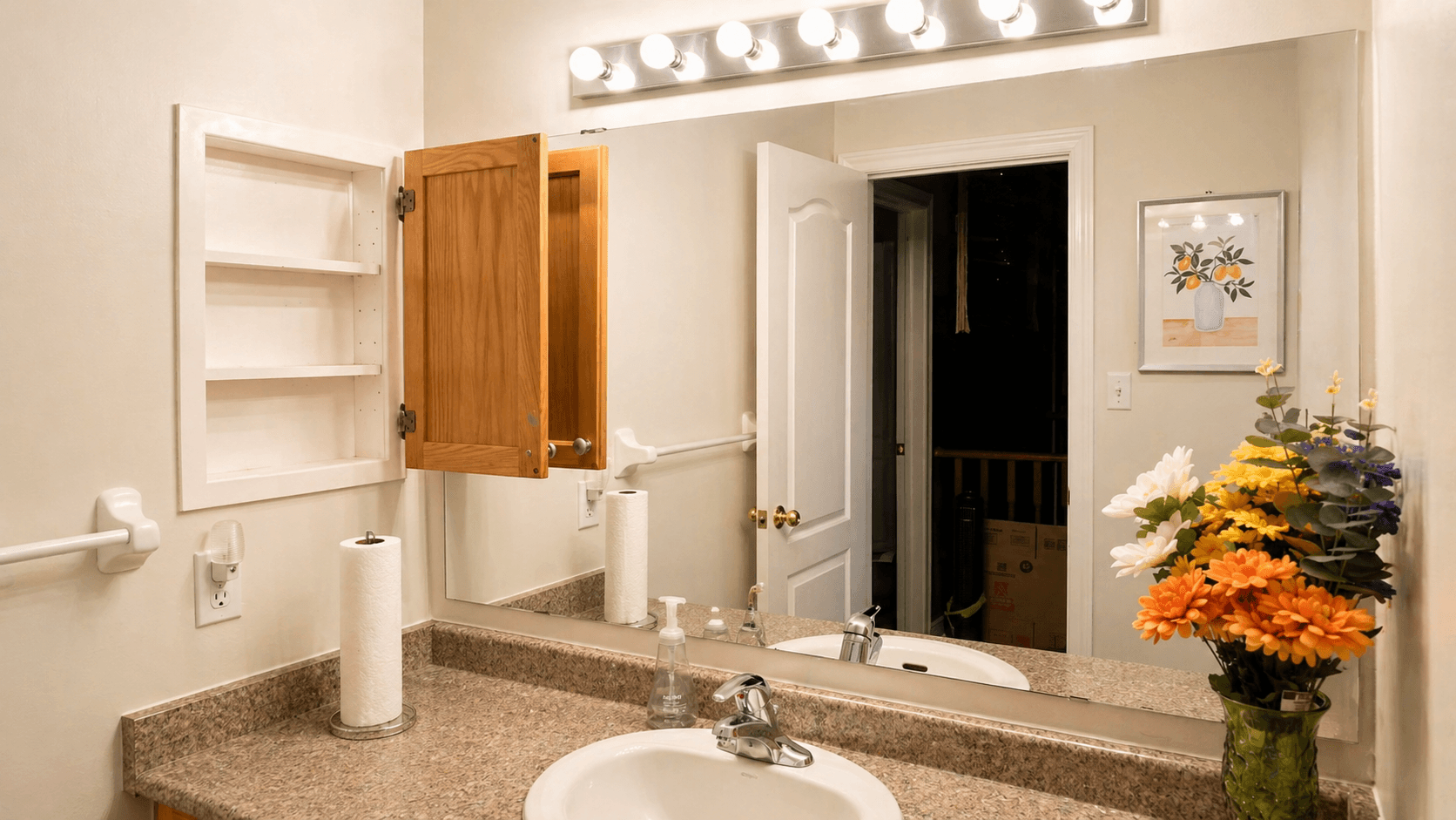 Cozy Bathroom with Vanity and Flowers at 2 Bedroom Main Floor Unit in Northeast Ajax – 45 Thackery Drive, a 2 bedroom rental in 45 Thackery Drive, Ajax, ON, listed for $1,500 per month