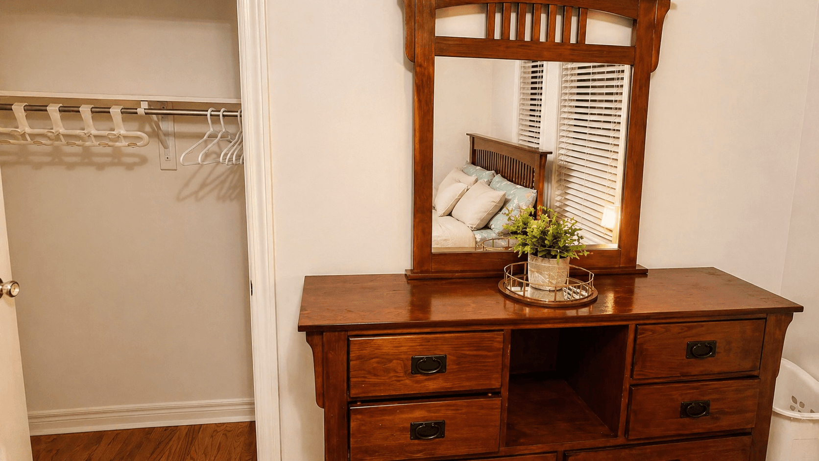 Cozy Bedroom with Dresser and Mirror at 2 Bedroom Main Floor Unit in Northeast Ajax – 45 Thackery Drive, a 2 bedroom rental in 45 Thackery Drive, Ajax, ON, listed for $1,500 per month
