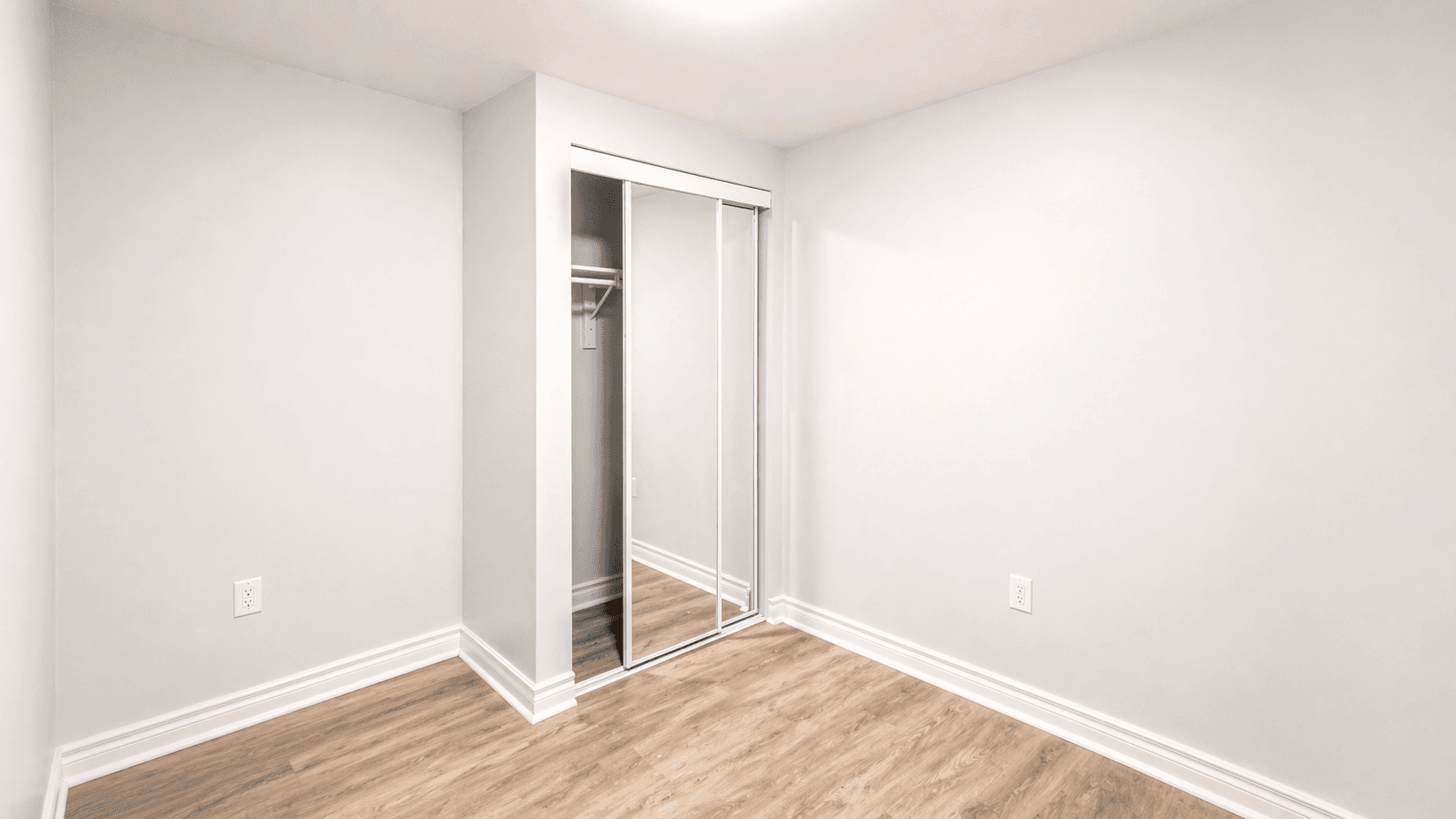 Simple Bedroom with Closet and Mirror at Spacious 2-Bedroom Basement Unit for Rent – 117 Hibbard Dr, Ajax, a 2 bedroom rental in 117 Hibbard Drive, Ajax, ON, listed for $1,900 per month