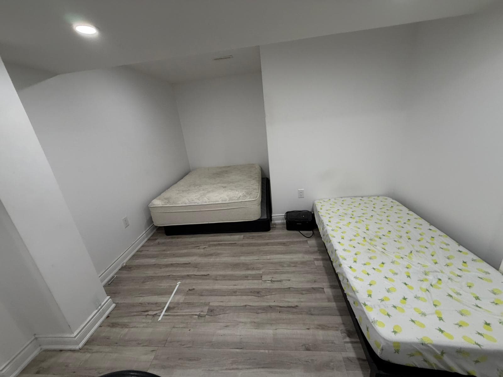 Guest Bedroom with Two Beds at 1 Bedroom Room for Rent in Brampton for $800, a 1 bedroom rental in 23 Maddybeth Crescent, Brampton, ON, listed for $850 per month