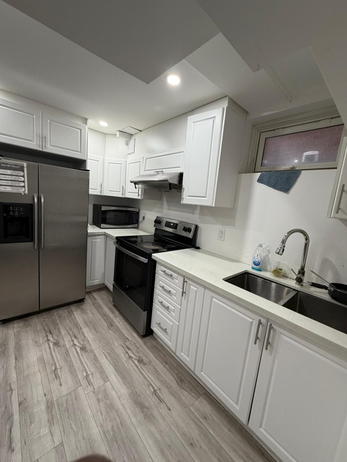 Modern Kitchen with Stainless Steel Appliances at 1 Bedroom Room for Rent in Brampton for $800, a 1 bedroom rental in 23 Maddybeth Crescent, Brampton, ON, listed for $850 per month