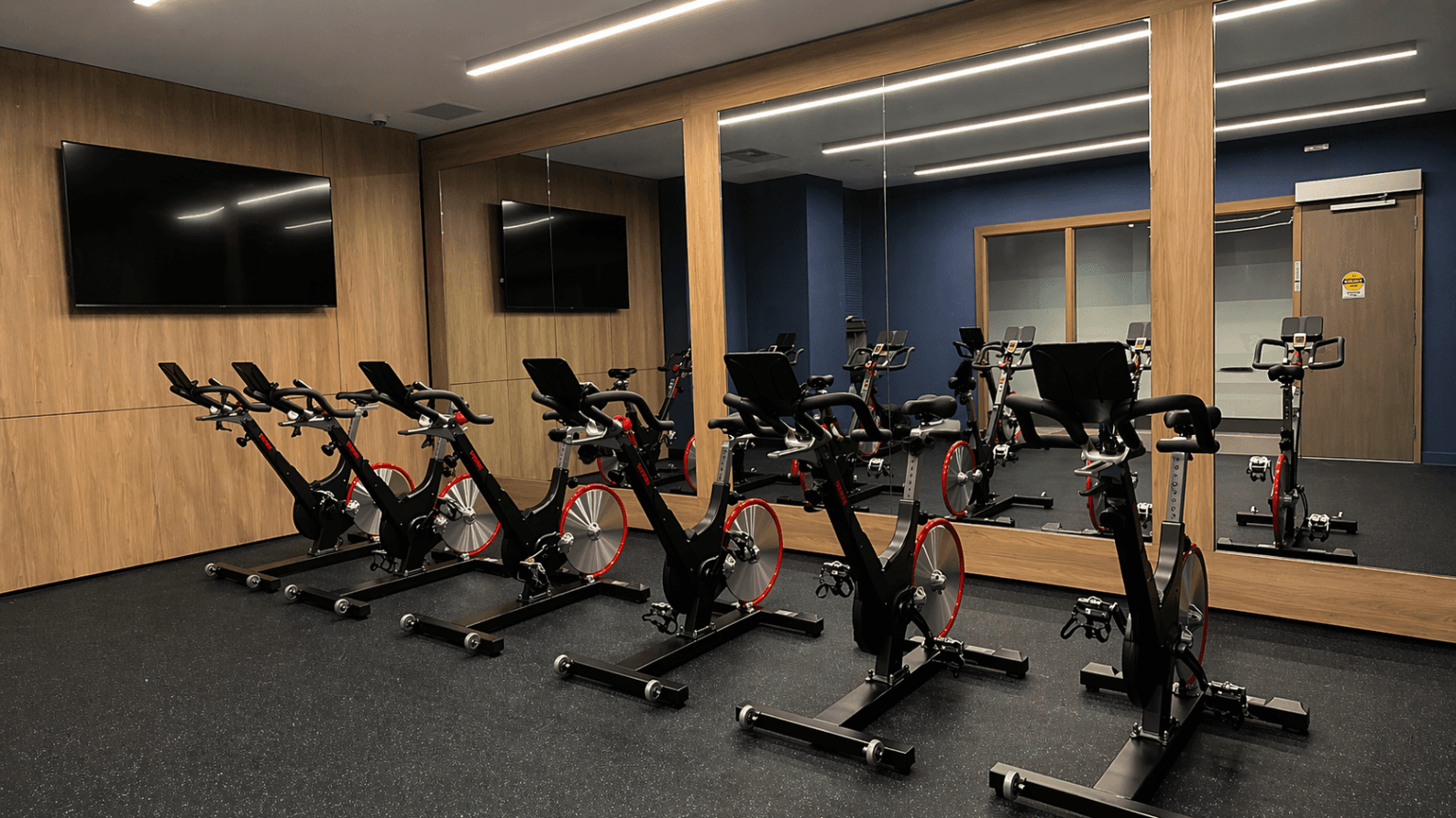 Indoor Cycling Room with Spin Bikes at Brand New 1-Bedroom Condo in Prime Hamilton Location, a 1 bedroom rental in 75 James Street South, Hamilton, ON, listed for $1,850 per month