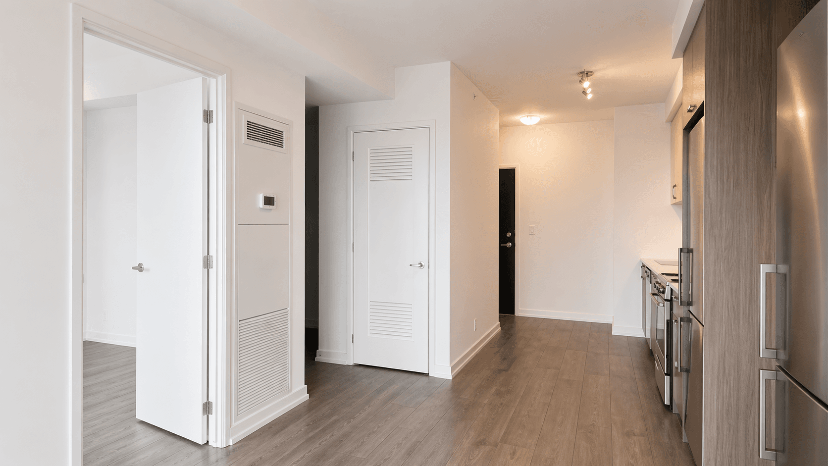 Modern Kitchen with Stainless Appliances at Brand New 1-Bedroom Condo in Prime Hamilton Location, a 1 bedroom rental in 75 James Street South, Hamilton, ON, listed for $1,850 per month