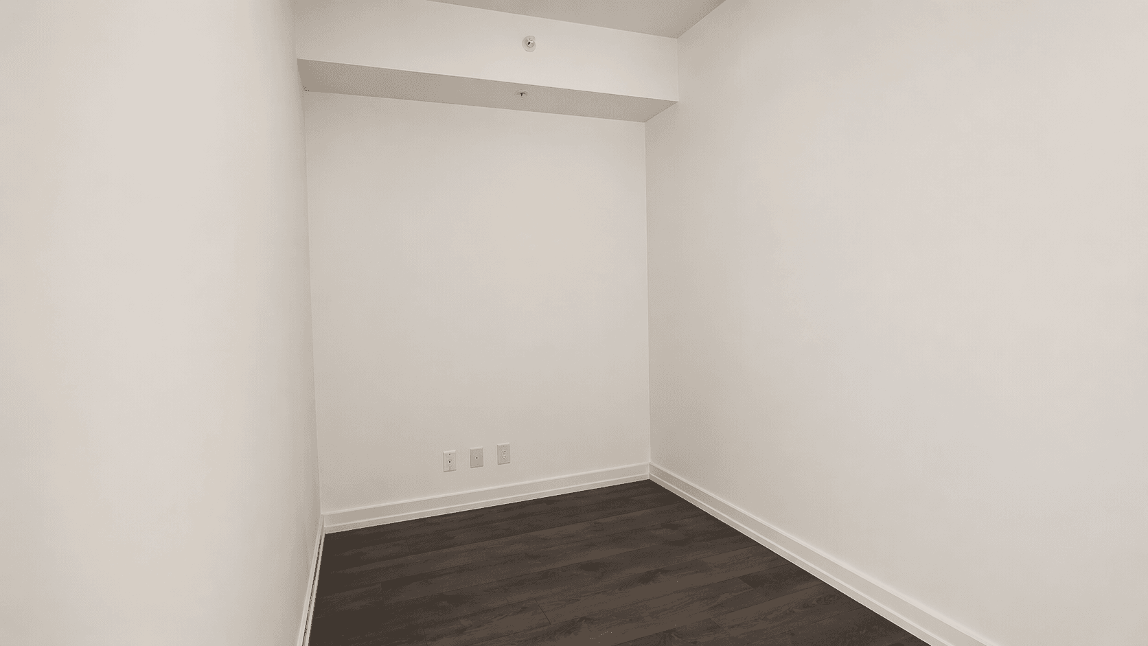 Empty Room with Light Flooring and White Walls at Brand New 1-Bedroom Condo in Prime Hamilton Location, a 1 bedroom rental in 75 James Street South, Hamilton, ON, listed for $1,850 per month