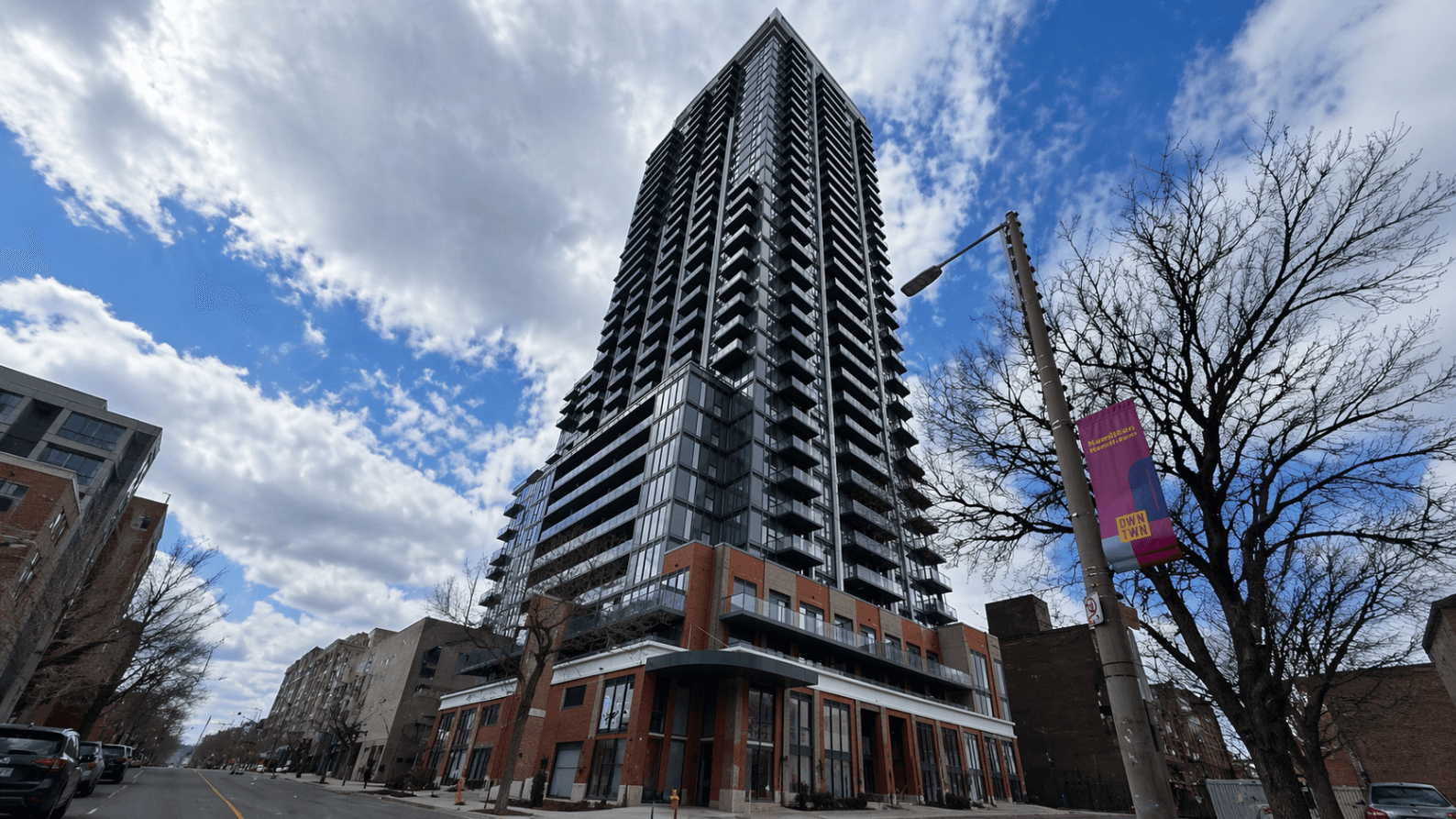 Modern High-Rise Building Exterior at Brand New 1-Bedroom Condo in Prime Hamilton Location, a 1 bedroom rental in 75 James Street South, Hamilton, ON, listed for $1,850 per month