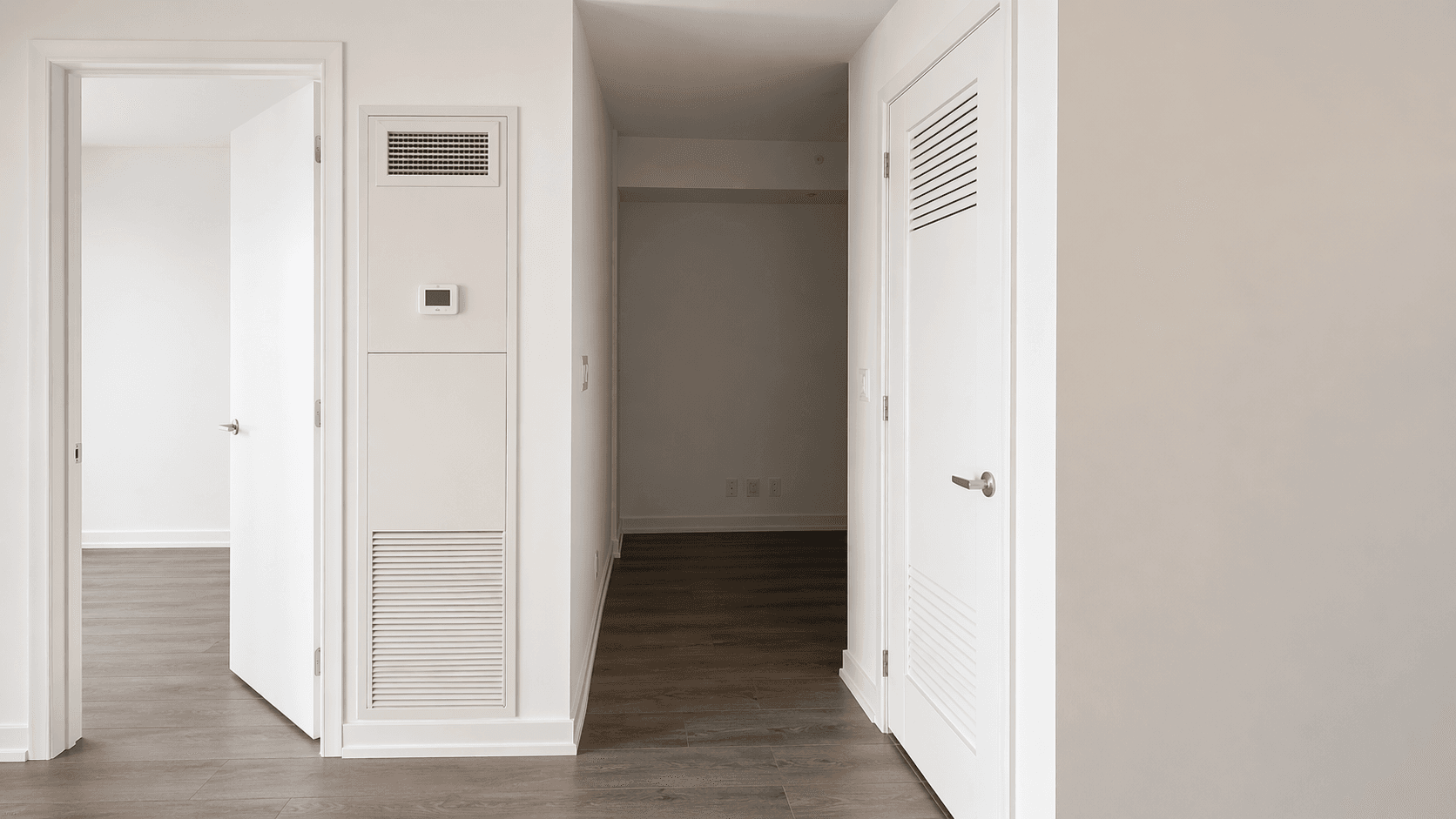 Hallway with Doors and Air Vent at Brand New 1-Bedroom Condo in Prime Hamilton Location, a 1 bedroom rental in 75 James Street South, Hamilton, ON, listed for $1,850 per month