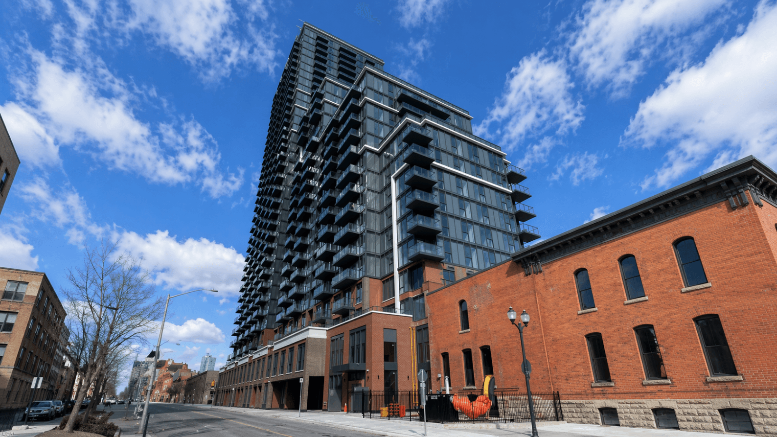 Modern High-Rise Building Facade at Brand New 1-Bedroom Condo in Prime Hamilton Location, a 1 bedroom rental in 75 James Street South, Hamilton, ON, listed for $1,850 per month