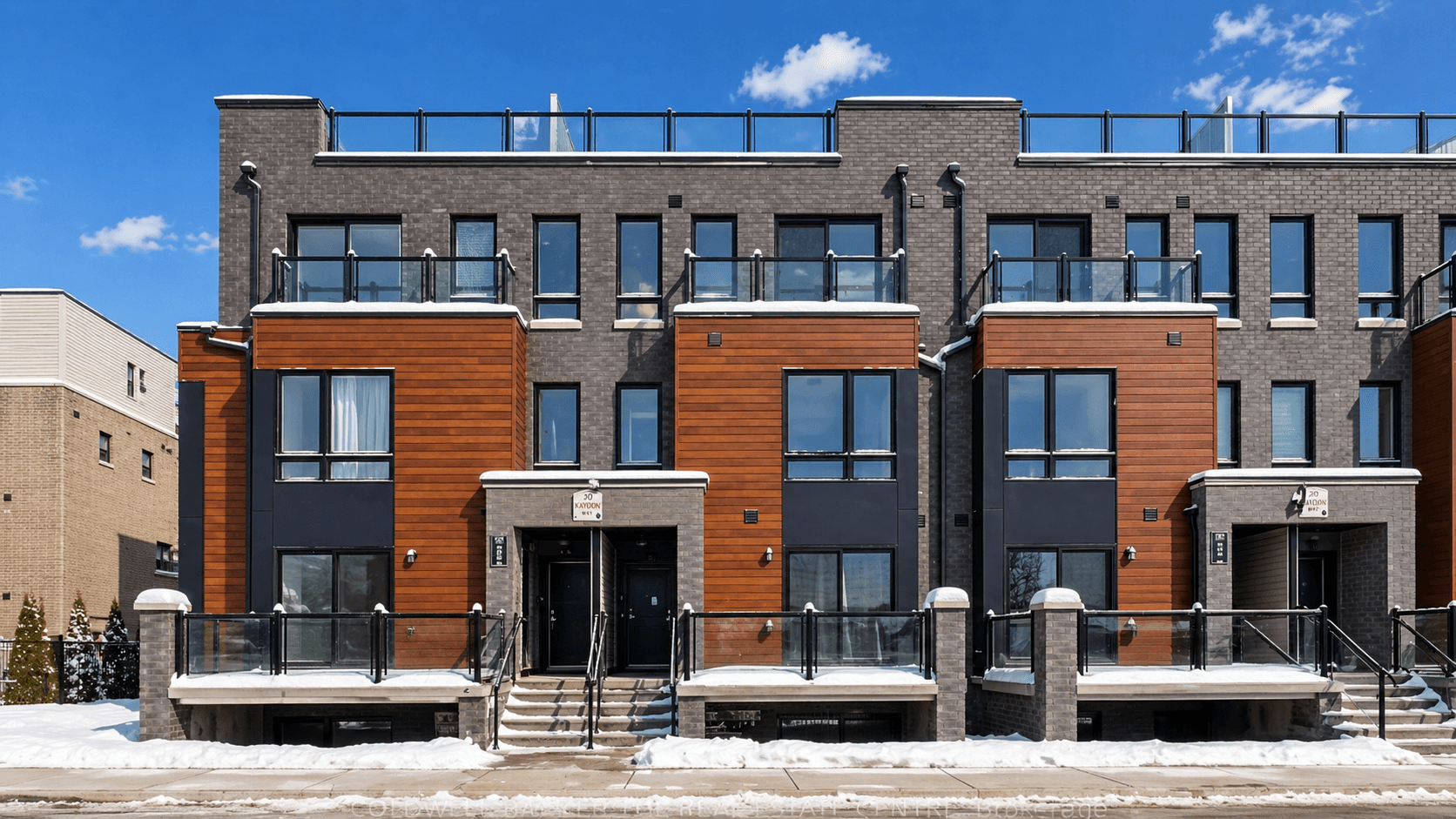 Front View of Modern Townhomes at Rental Listing in Scarborough, a 1 bedroom rental in 165 Tapscott Road, Scarborough, ON, listed for $1,000 per month