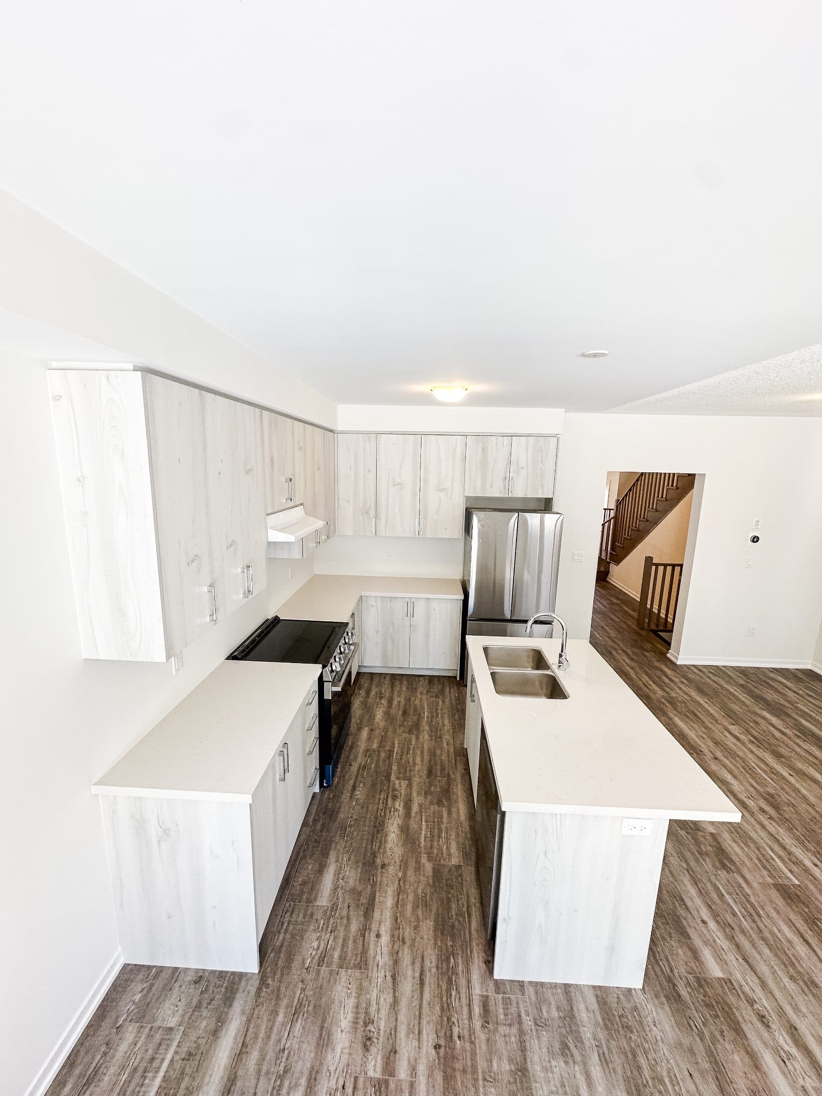 Modern Kitchen with Sleek Design at 1 Bedroom Townhouse in Oshawa for $1,200, a 1 bedroom rental in 2004 Horace Duncan Crescent, Oshawa, ON, listed for $1,200 per month