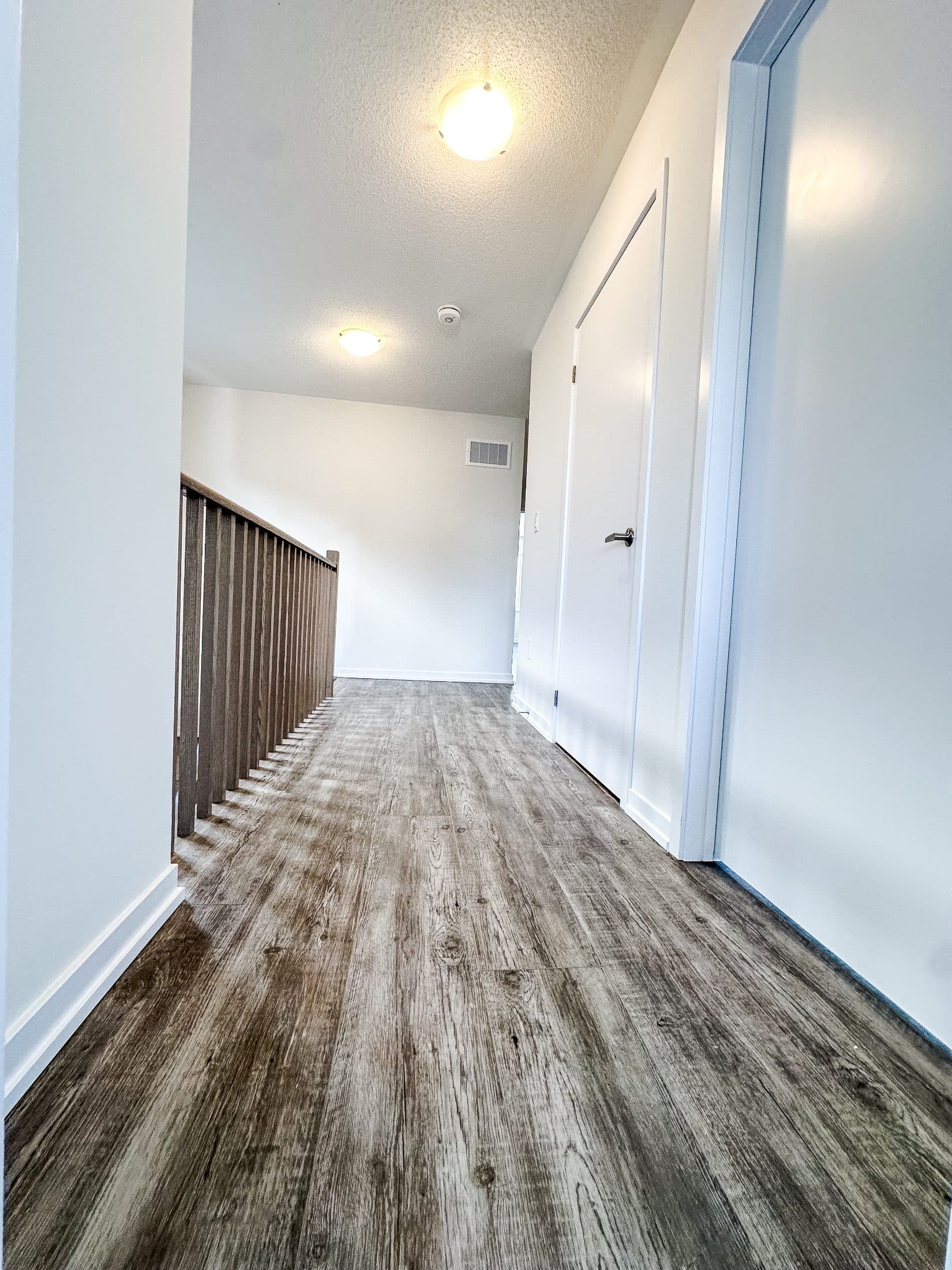 Bright Hallway with Wood Flooring at 1 Bedroom Townhouse in Oshawa for $1,200, a 1 bedroom rental in 2004 Horace Duncan Crescent, Oshawa, ON, listed for $1,200 per month