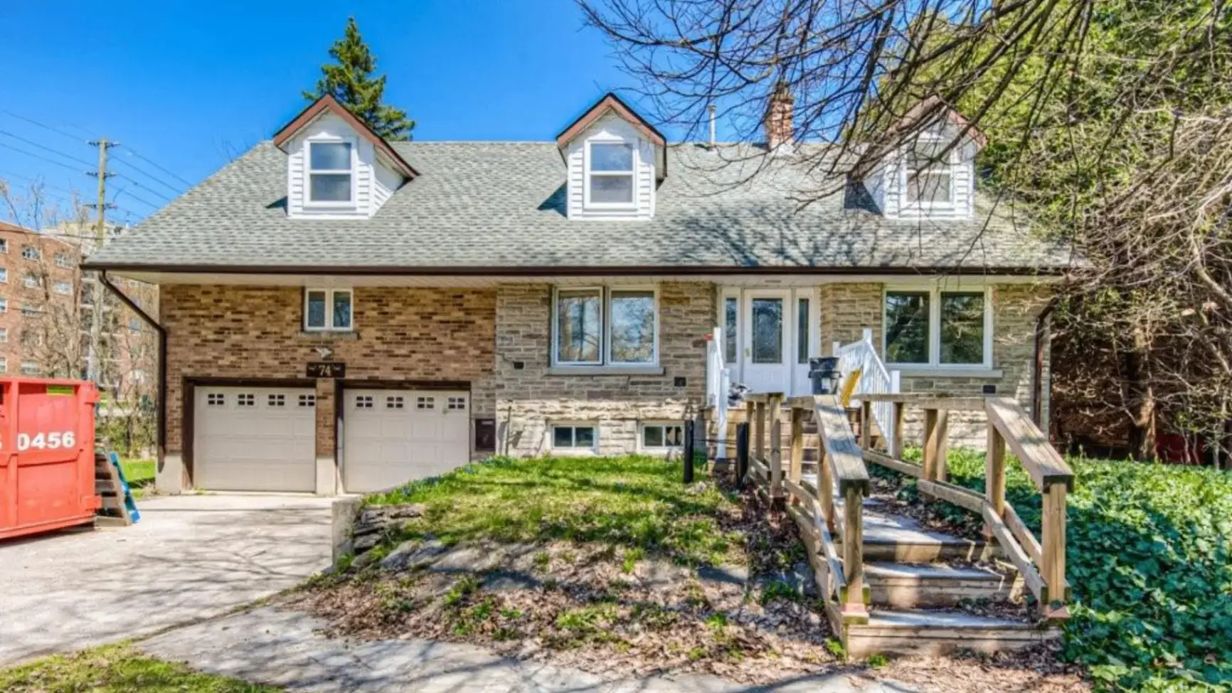 Front View of House with Driveway at Spacious 3-Bedroom Main Level in Waterloo – Prime Location, a 3 bedroom rental in 74 McDougall Road, Waterloo, ON, listed for $2,550 per month