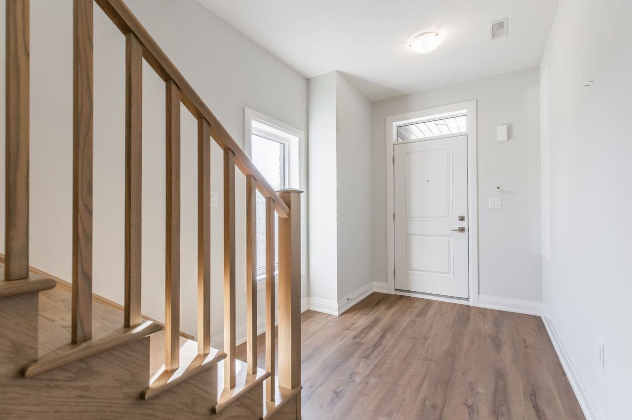 Bright Entrance with Stairs at A cozy Bedroom in 4 Bedroom House, a 1 bedroom rental in 23 BayBerry Lane, Hamilton, ON, listed for $800 per month