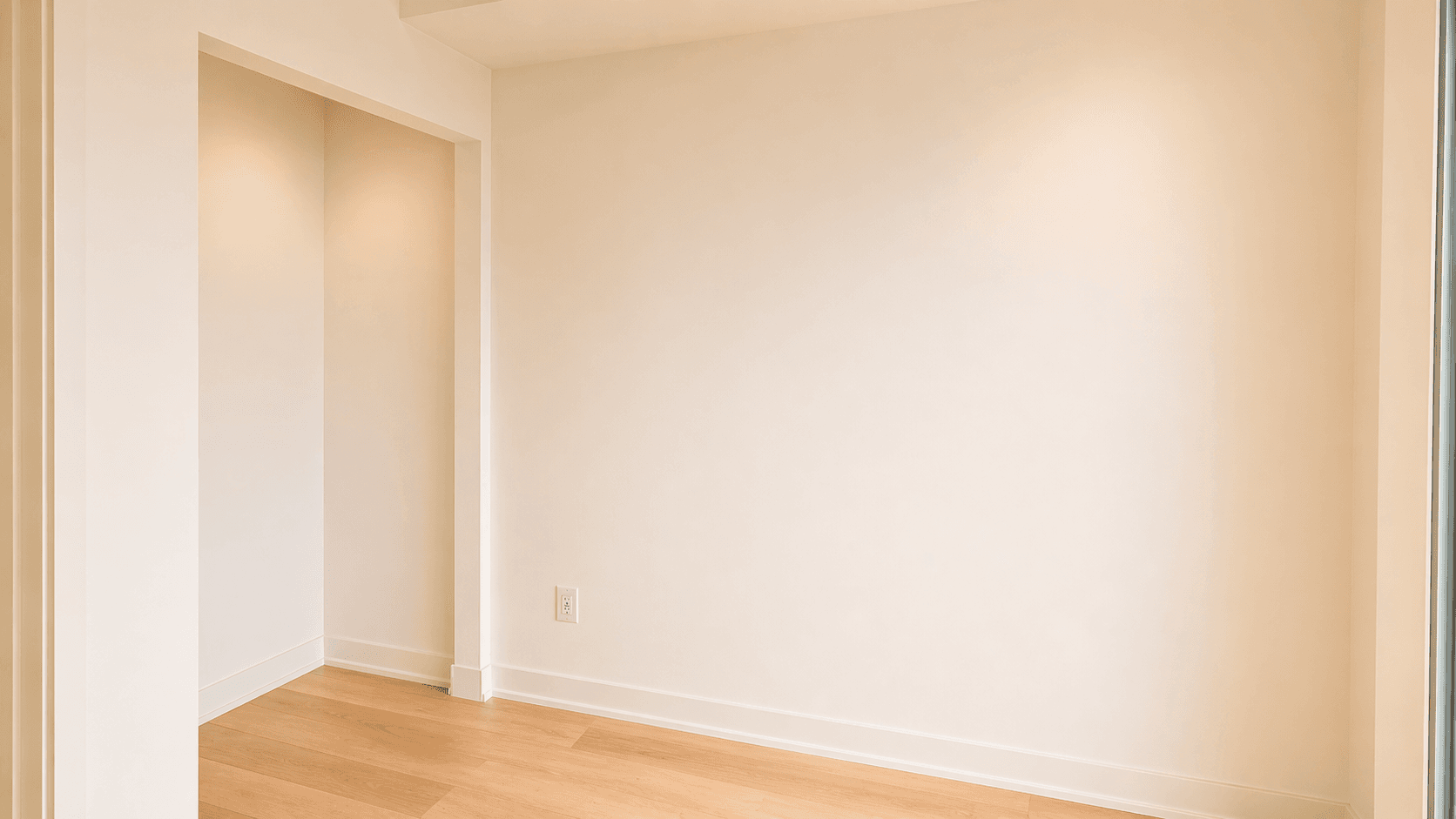 Interior Space with Light Walls and Wood Floor at Yorkwoods Condos – 2839 Jane Street, Toronto, a 2 bedroom rental in 2839 Jane Street, North York, ON, listed for $2,300 per month