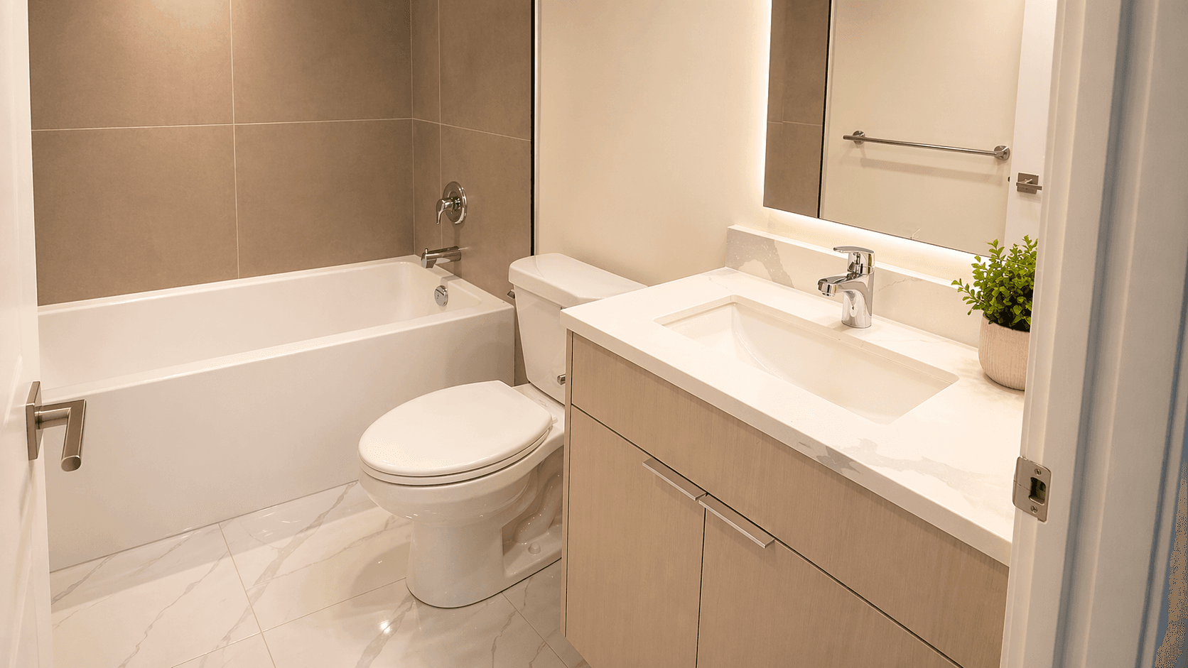 Modern Bathroom with Bath and Sink at Yorkwoods Condos – 2839 Jane Street, Toronto, a 2 bedroom rental in 2839 Jane Street, North York, ON, listed for $2,300 per month