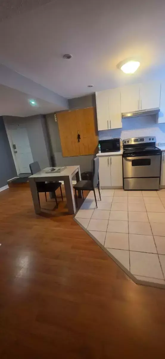 Compact Kitchen with Dining Table at 2 Bedroom Apartment in Brampton for $2,000, a 2 bedroom rental in 22 Iguana crescent, Brampton, ON, listed for $2,000 per month
