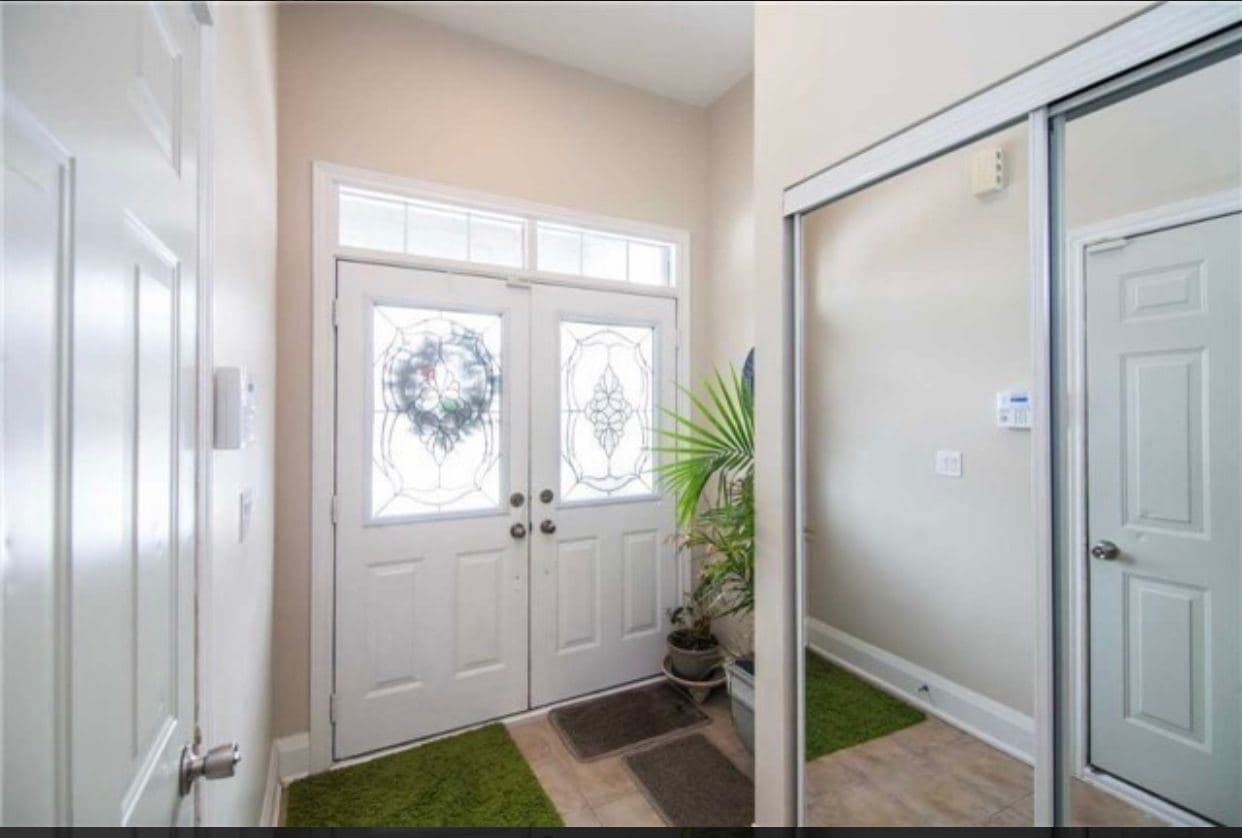 Welcoming Entrance with Double Doors at Spacious 4-Bedroom Detached Home for Rent – 25 Penny Royal Cres, Brampton, a 4 bedroom rental in 25 Pennyroyal Crescent, Brampton, ON, listed for $3,400 per month