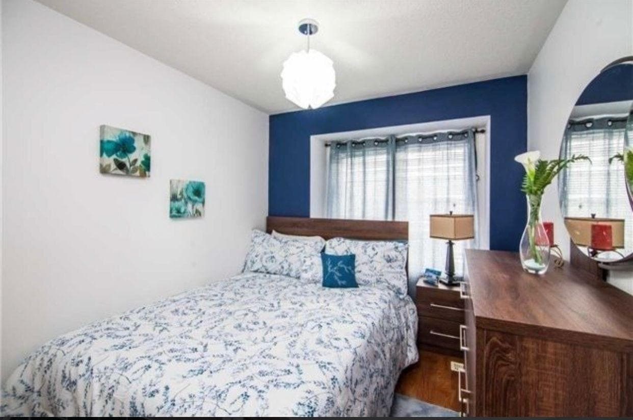 Cozy Primary Bedroom with Decor at Spacious 4-Bedroom Detached Home for Rent – 25 Penny Royal Cres, Brampton, a 4 bedroom rental in 25 Pennyroyal Crescent, Brampton, ON, listed for $3,400 per month