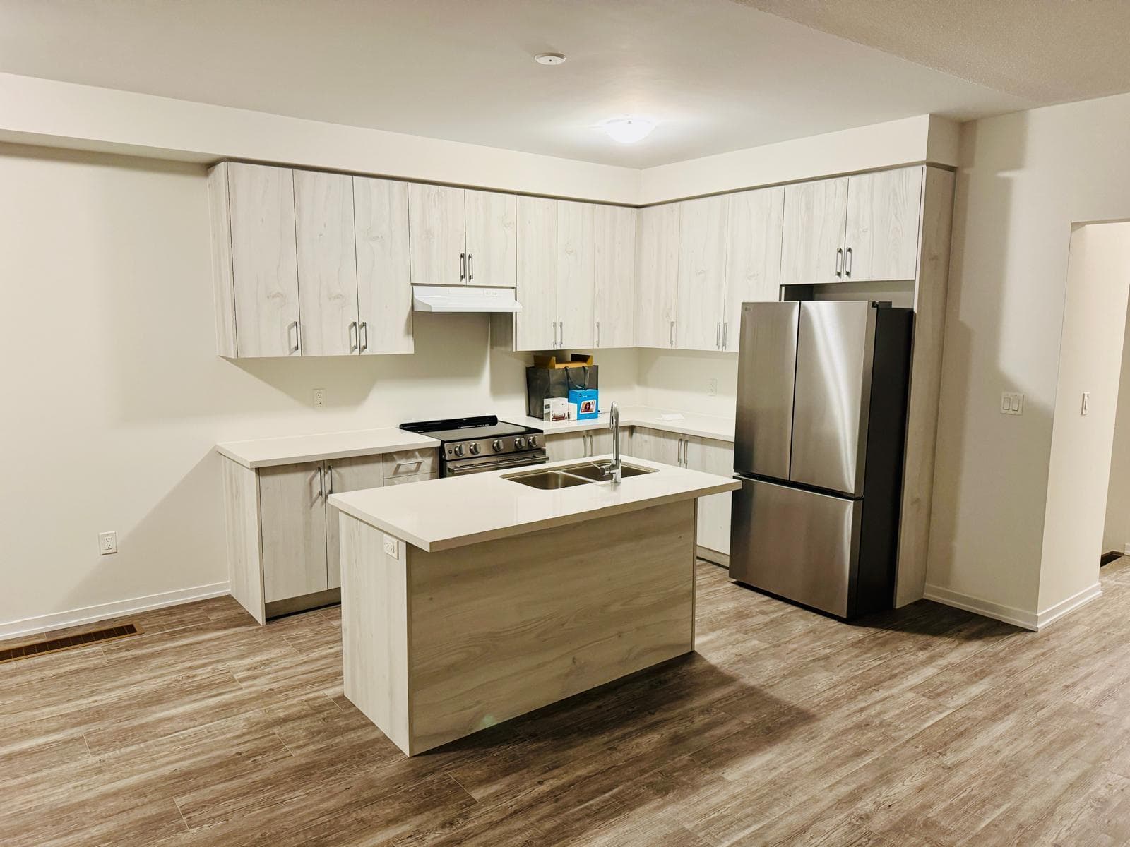 Modern Kitchen with Stainless Steel Appliances at 1 Bedroom Townhouse in Oshawa for $900, a 1 bedroom rental in 2004 Horace Duncan Crescent, Oshawa, ON, listed for $900 per month