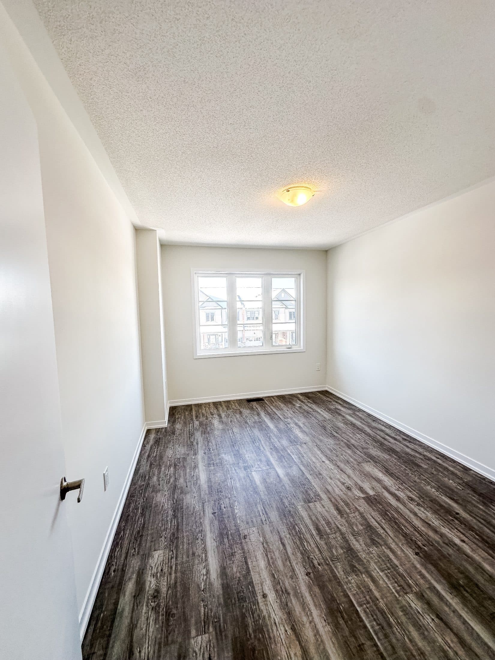 Bright and Spacious Guest Bedroom at 1 Bedroom Townhouse in Oshawa for $900, a 1 bedroom rental in 2004 Horace Duncan Crescent, Oshawa, ON, listed for $900 per month
