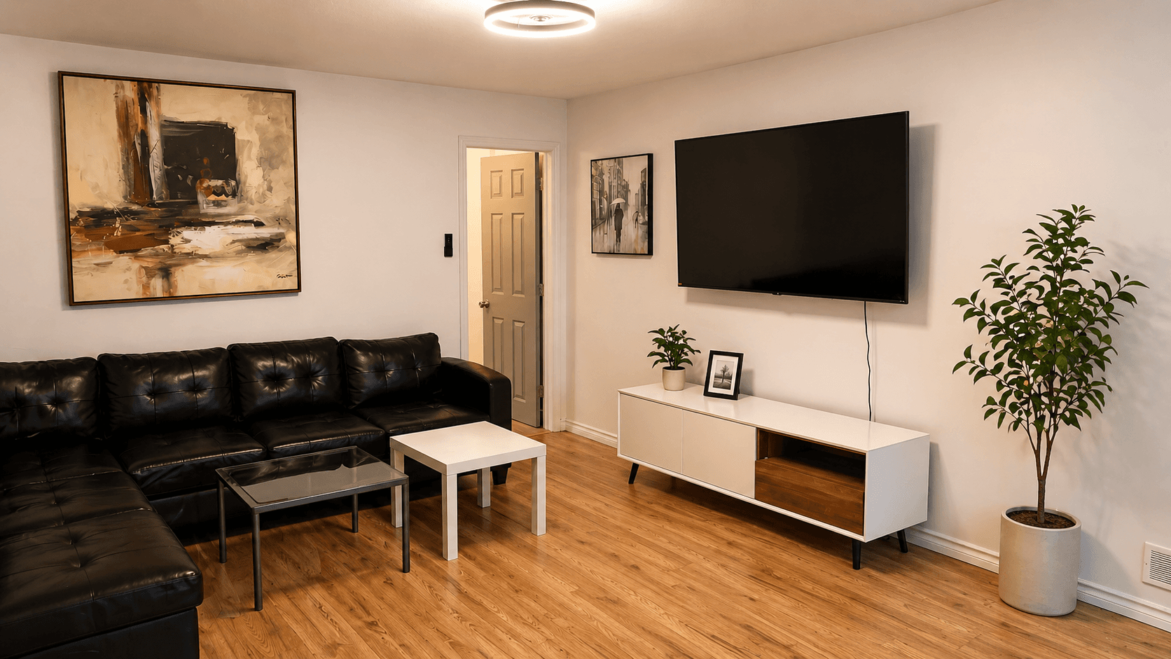 Cozy Living Room with Modern Decor at Modern 1-Bedroom Condo in Hintonburg, Ottawa – Prime Location, a 1 bedroom rental in 210 Armstrong Street, Ottawa, ON, listed for $1,795 per month