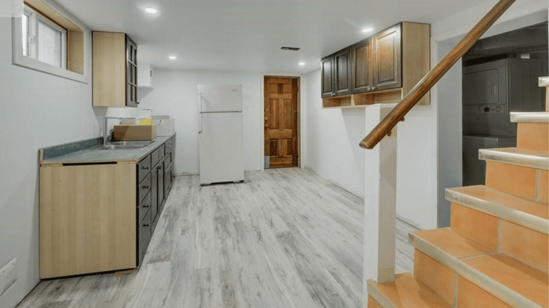 Functional Kitchen with Wooden Cabinets at Rental Listing in Waterloo, a rental rental in 74 McDougall Road, Waterloo, ON, listed for $6,000 per month