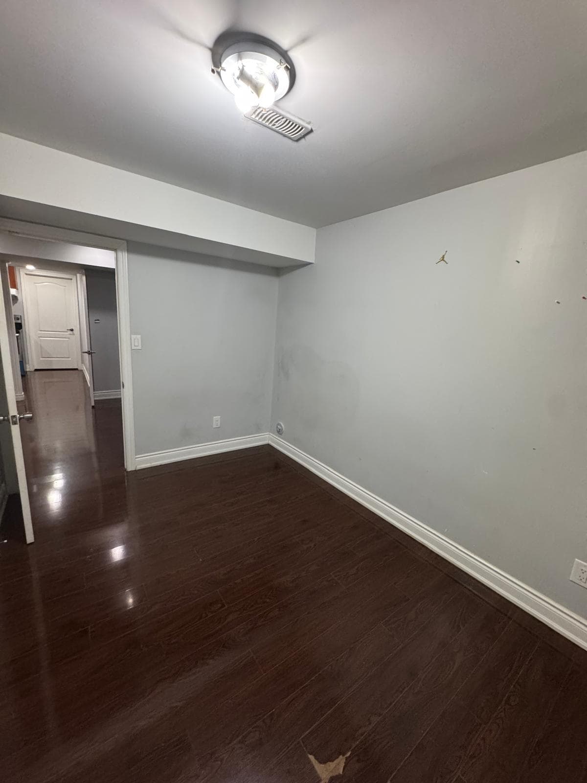 Secondary Bedroom with Brown Flooring at 2 Bedroom Basement Apartment in Brampton for $1,400, a 2 bedroom rental in 47 Speedwell Street, Brampton, Ontario (ON), listed for $1,400 per month