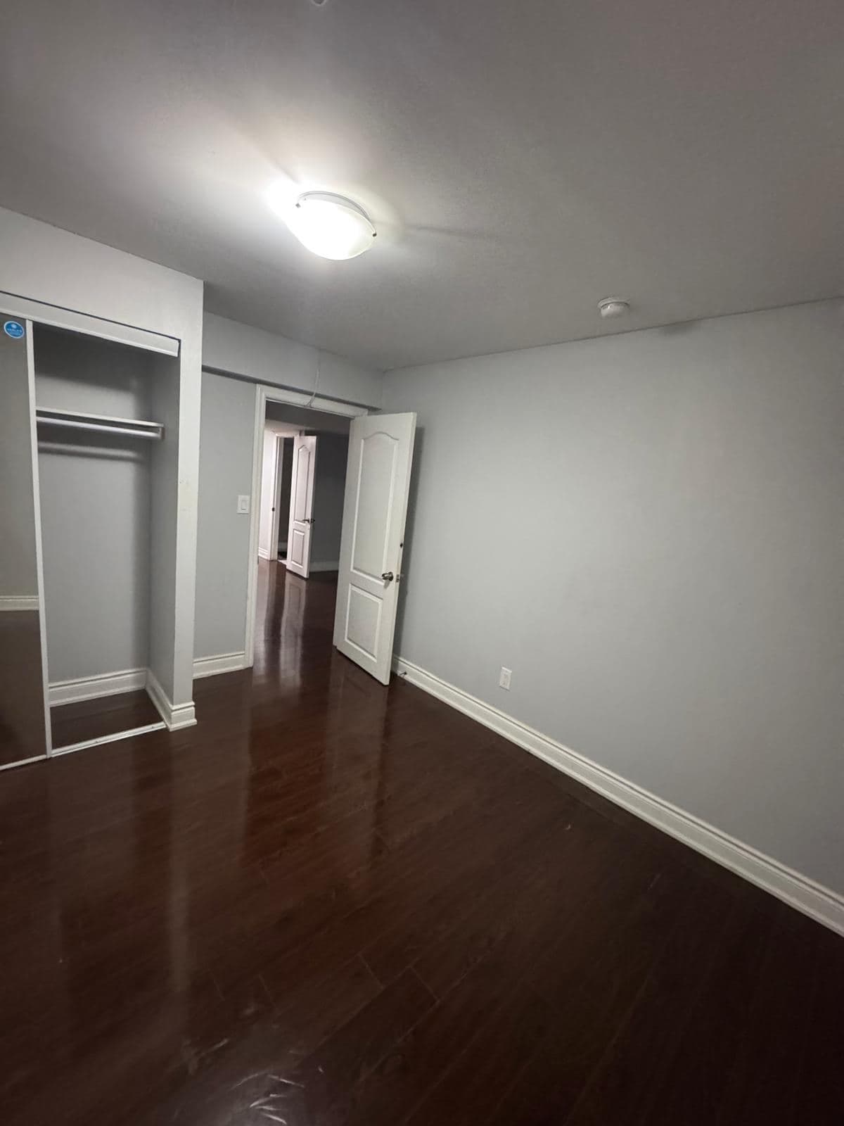 Secondary Bedroom with Mirror Closet at 2 Bedroom Basement Apartment in Brampton for $1,400, a 2 bedroom rental in 47 Speedwell Street, Brampton, Ontario (ON), listed for $1,400 per month