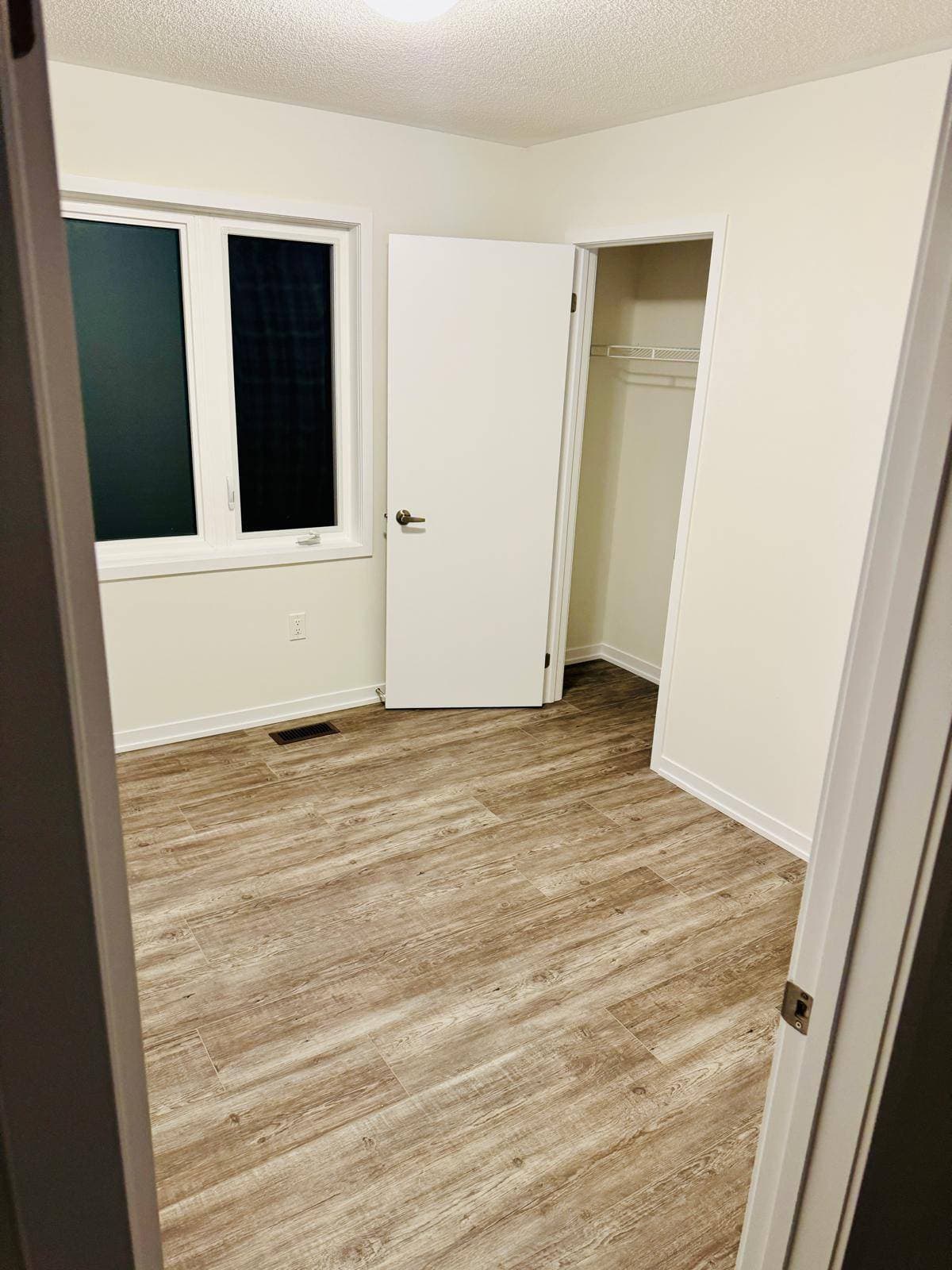 Cozy Guest Bedroom with Closet at 1 Bedroom Townhouse in Oshawa for $700, a 1 bedroom rental in 2004 Horace Duncan Crescent, Oshawa, ON, listed for $700 per month