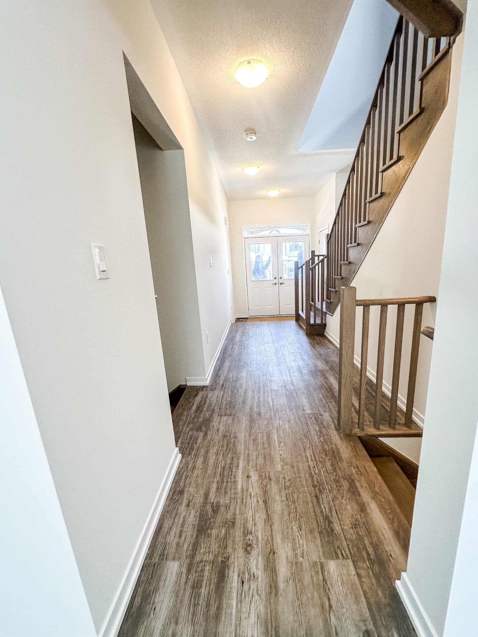 Bright Entrance Hallway at 1 Bedroom Townhouse in Oshawa for $700, a 1 bedroom rental in 2004 Horace Duncan Crescent, Oshawa, ON, listed for $700 per month